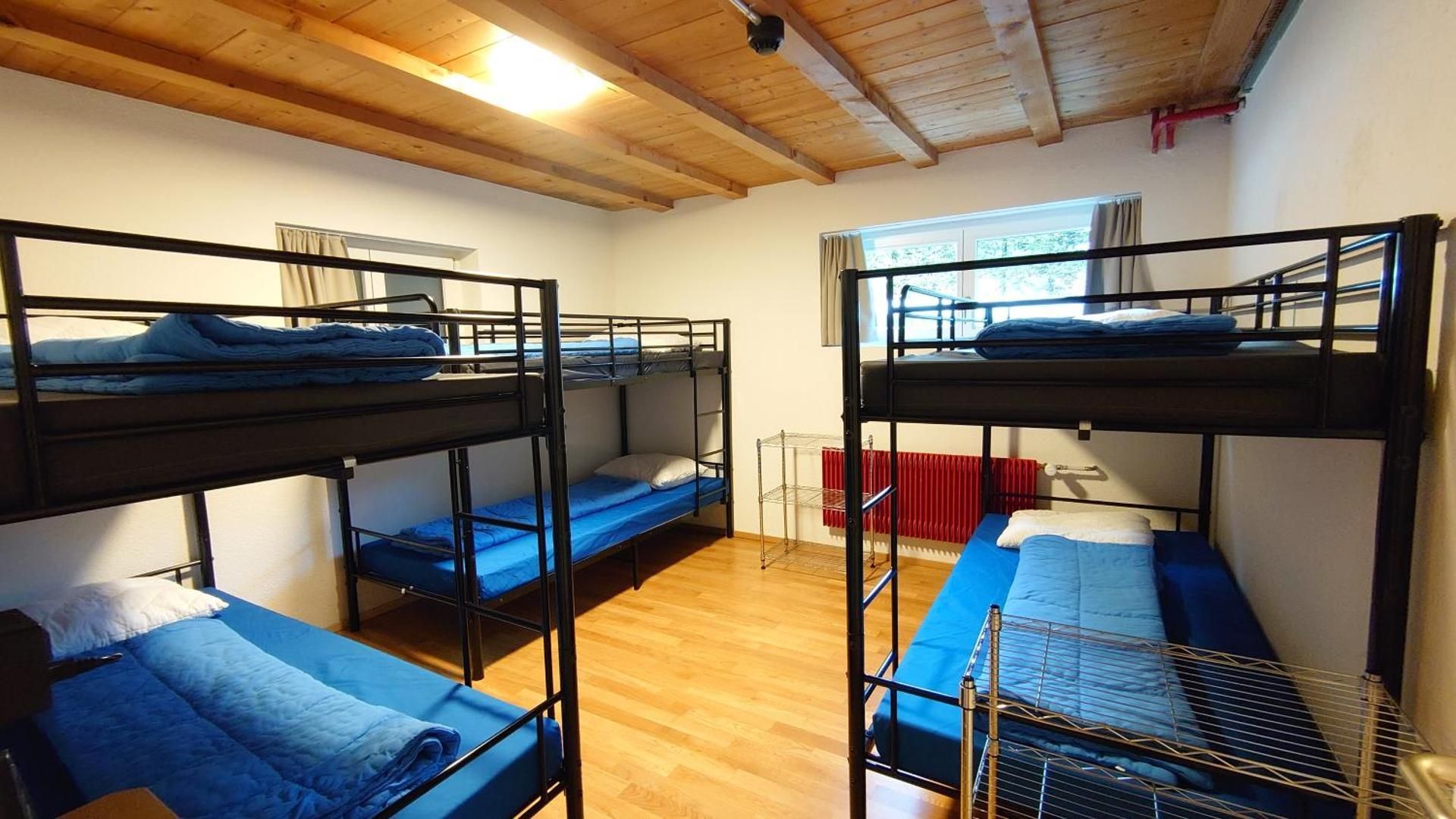 Bed in 6-Bed Female Dormitory Room with Shared Bathroom