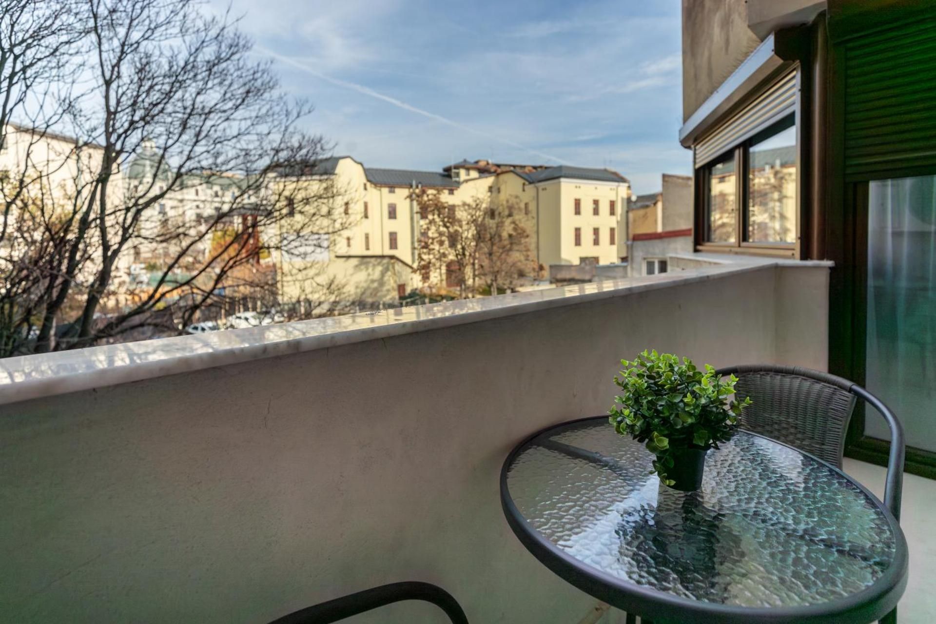 Exclusive One-Bedroom Apartment with Balcony and City View