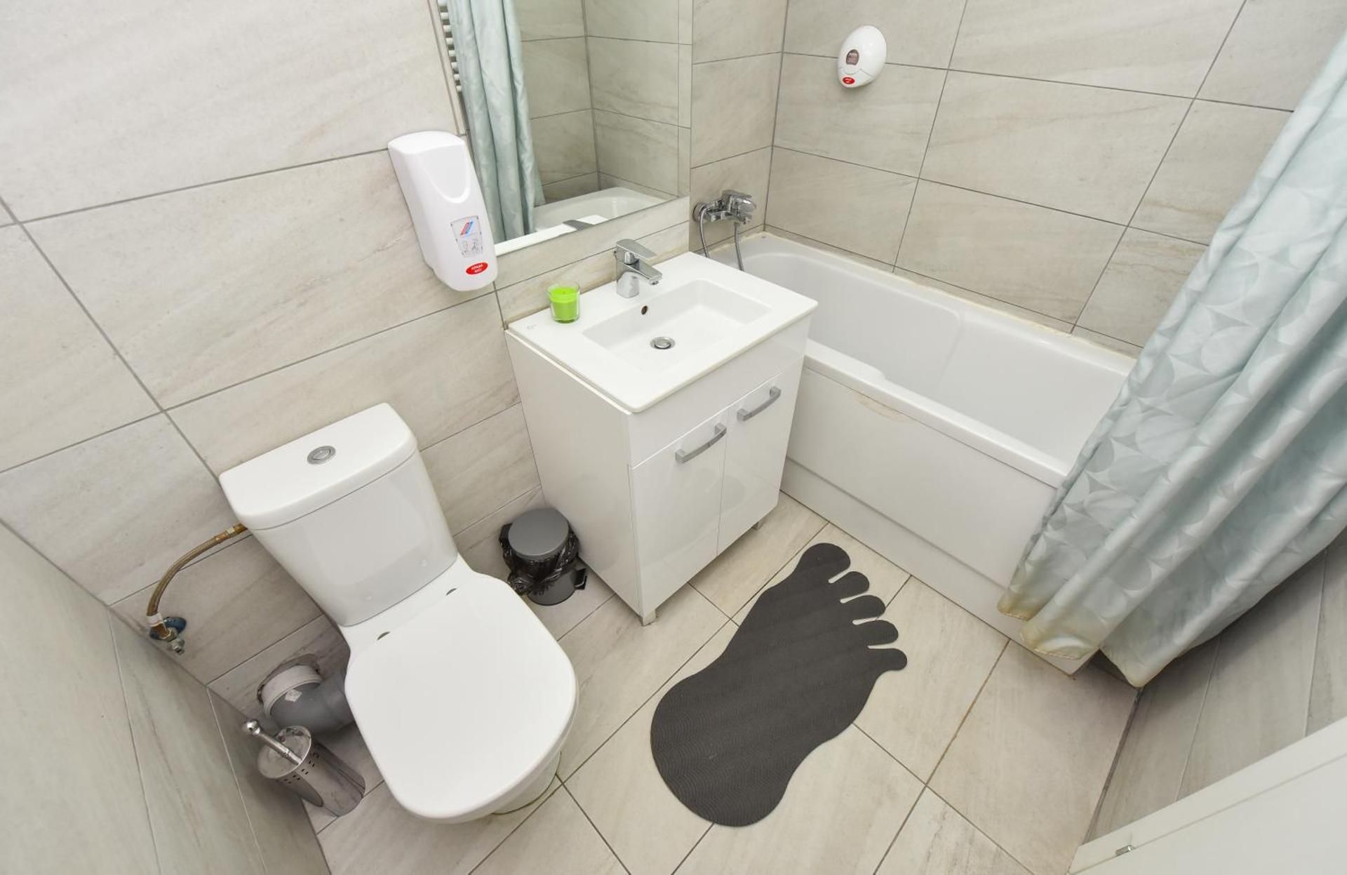 Three-Bedroom Apartment with Balcony