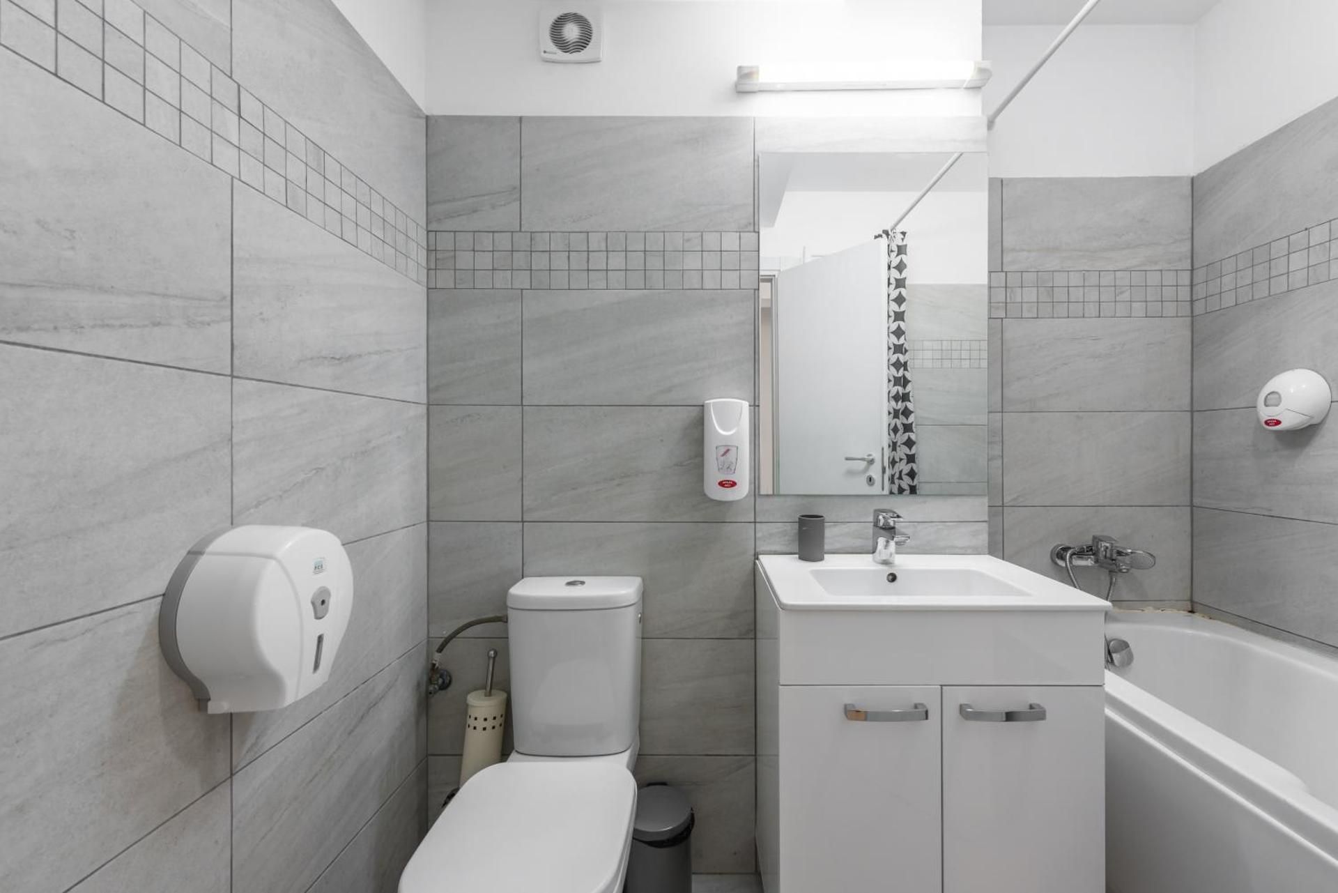 Three-Bedroom Apartment with Balcony