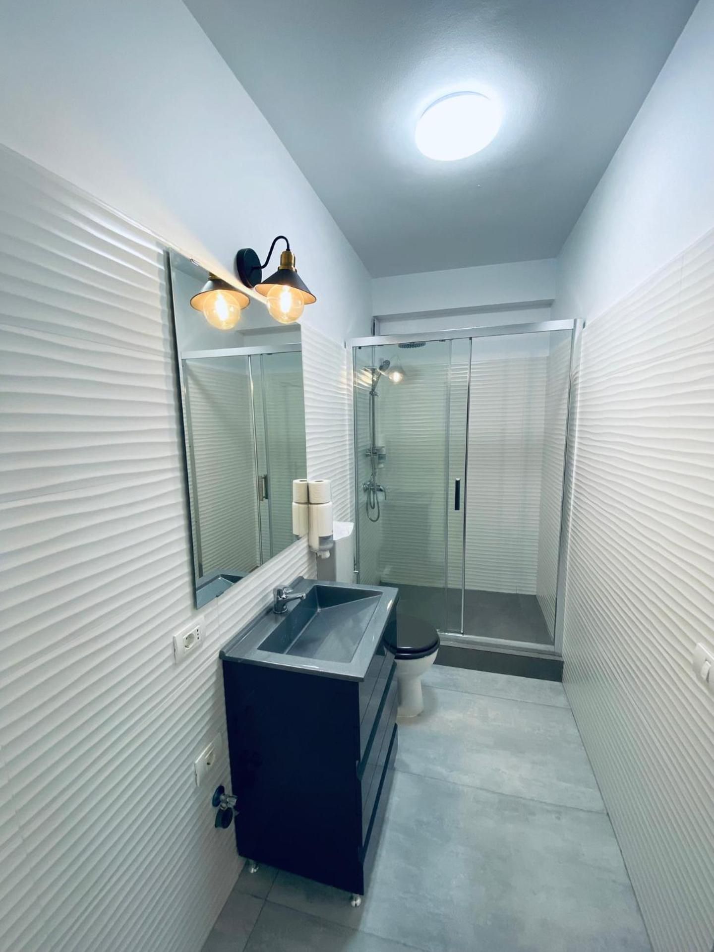 Three-Bedroom Apartment with Balcony