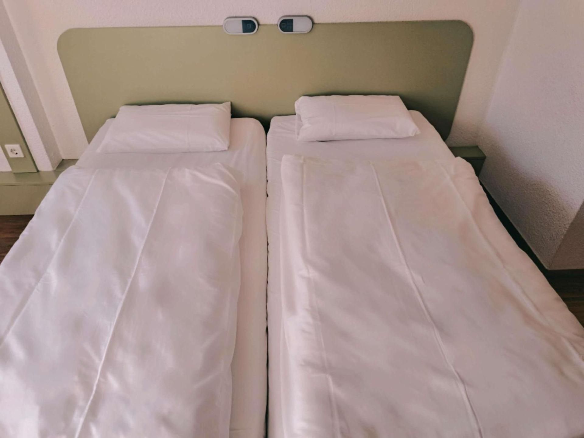 Twin room with 2 single size beds