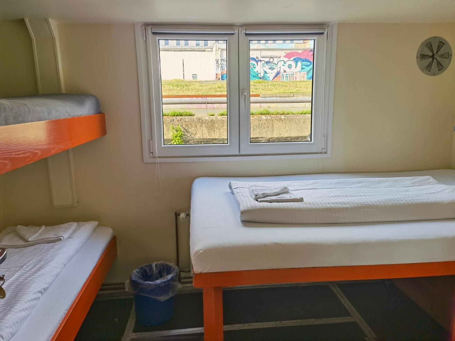 Eastern & Western Comfort Hostelboat Shipotel Western - Triple Cabin with Shared Bathroom 2