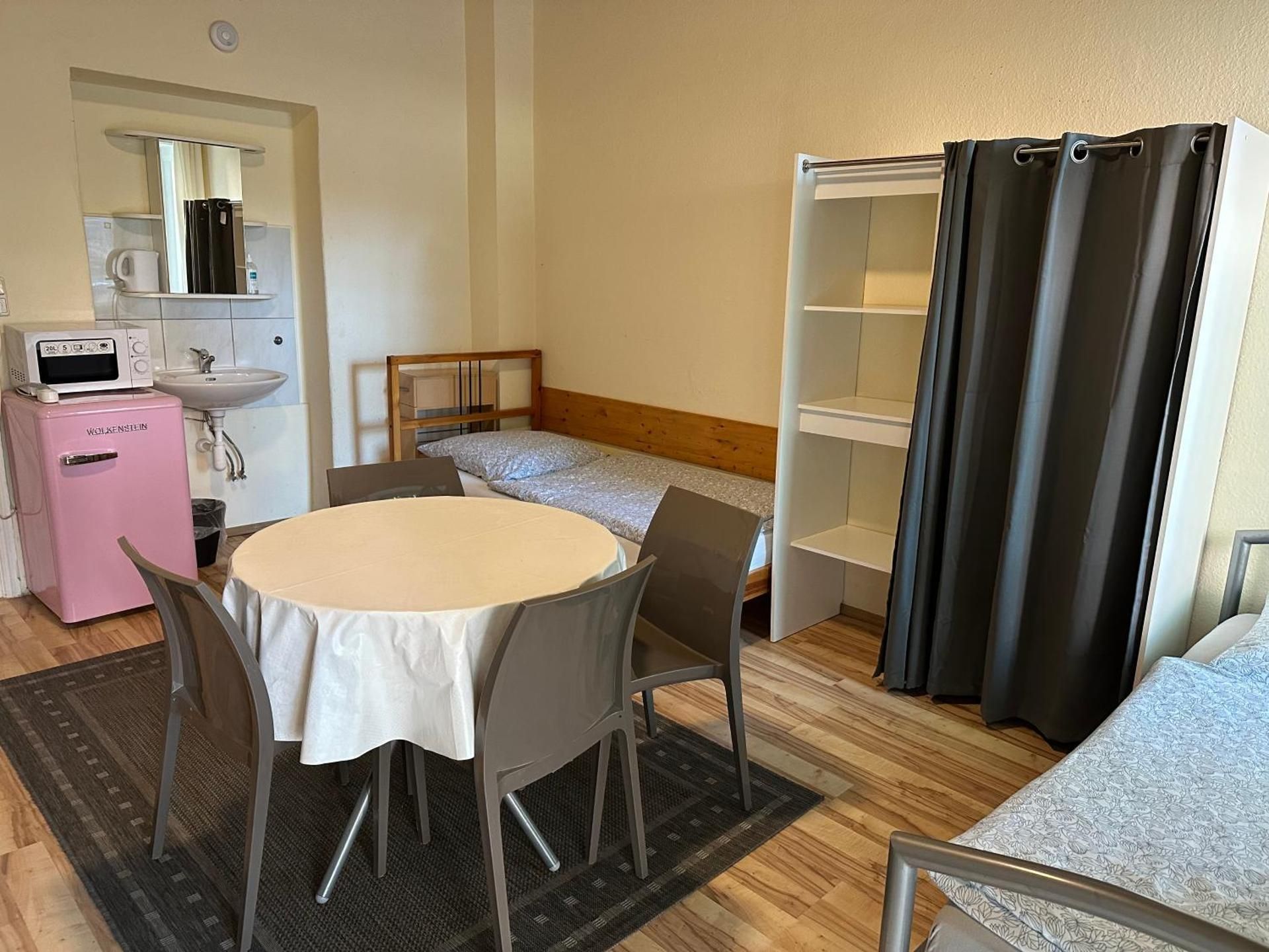 Economy Quadruple Room with Shared Bathroom