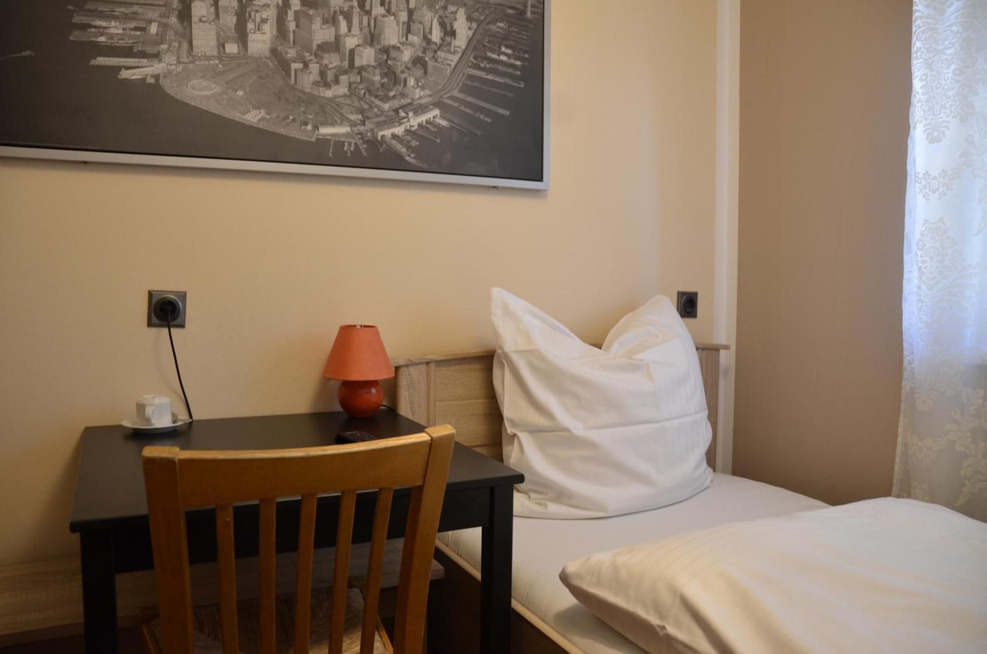 Basic Single Room with Shared Bathroom