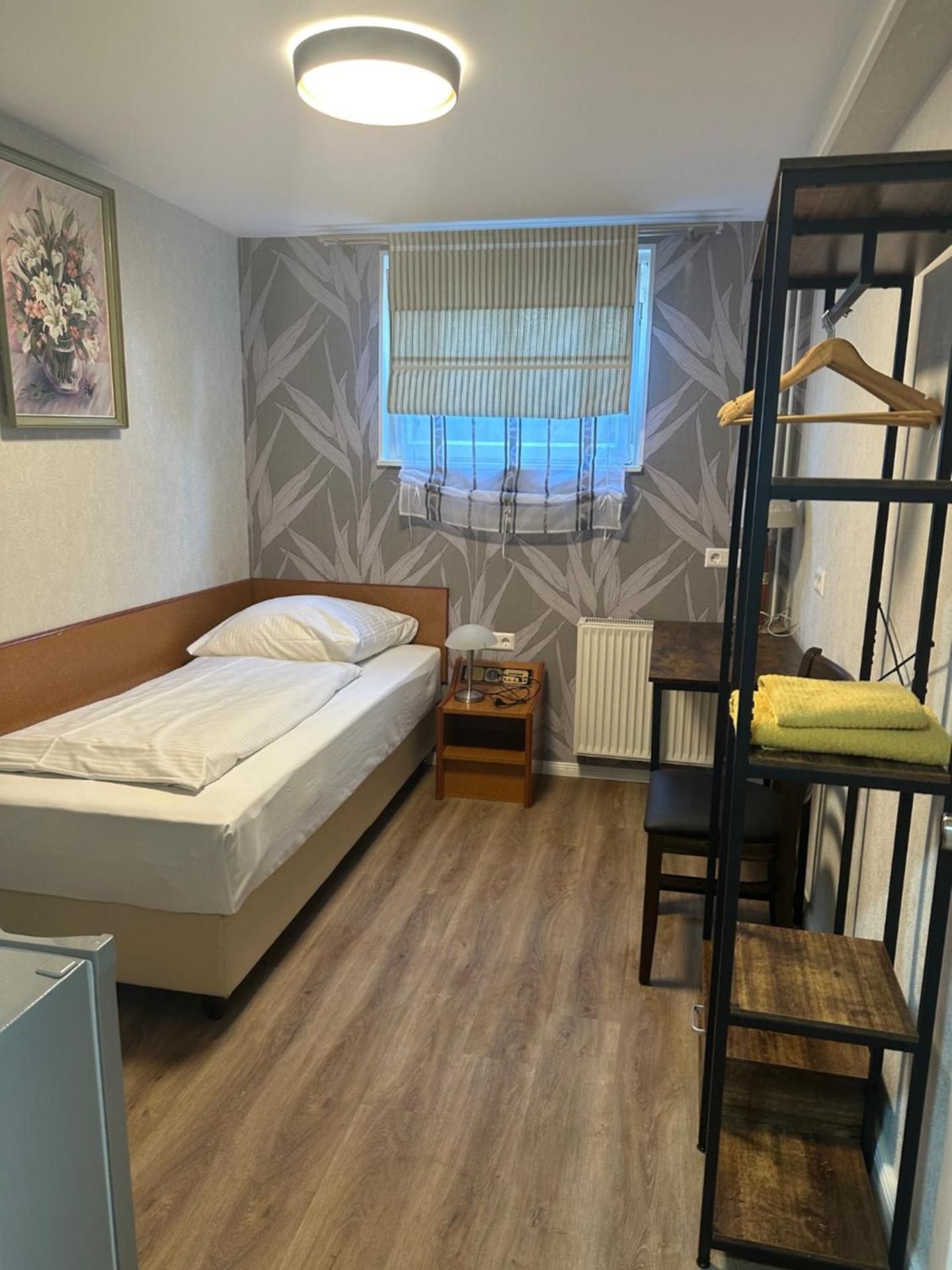 Single Room with Shared Shower and Toilet