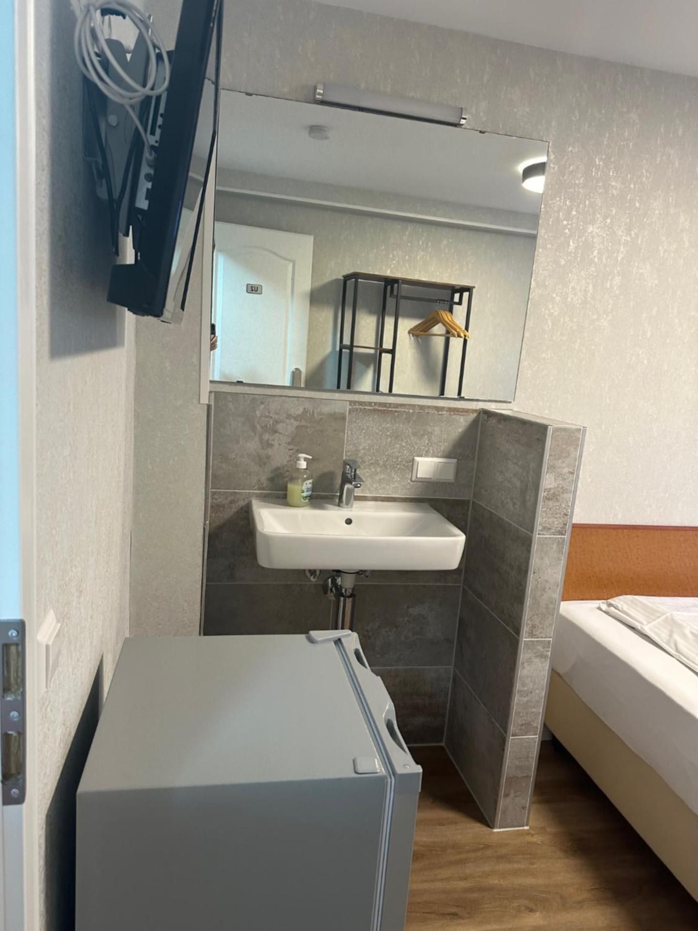 Single Room with Shared Shower and Toilet