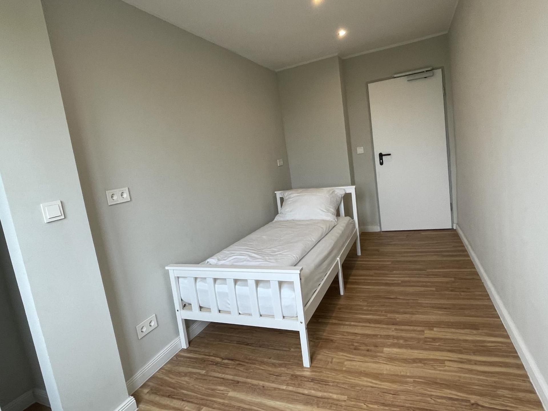 Single Room with Shared Shower and Toilet