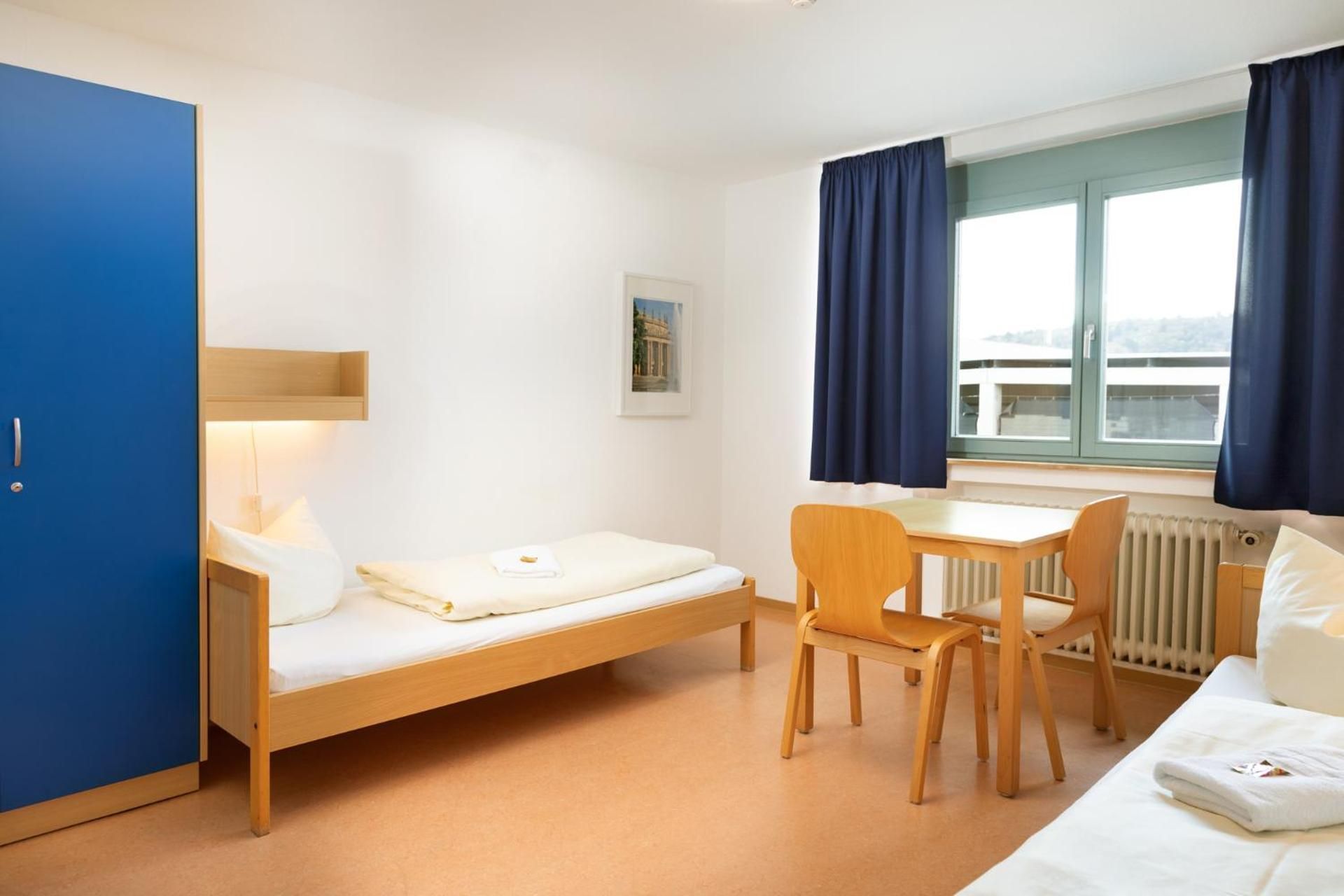 Single Room with Shared Shower and Toilet