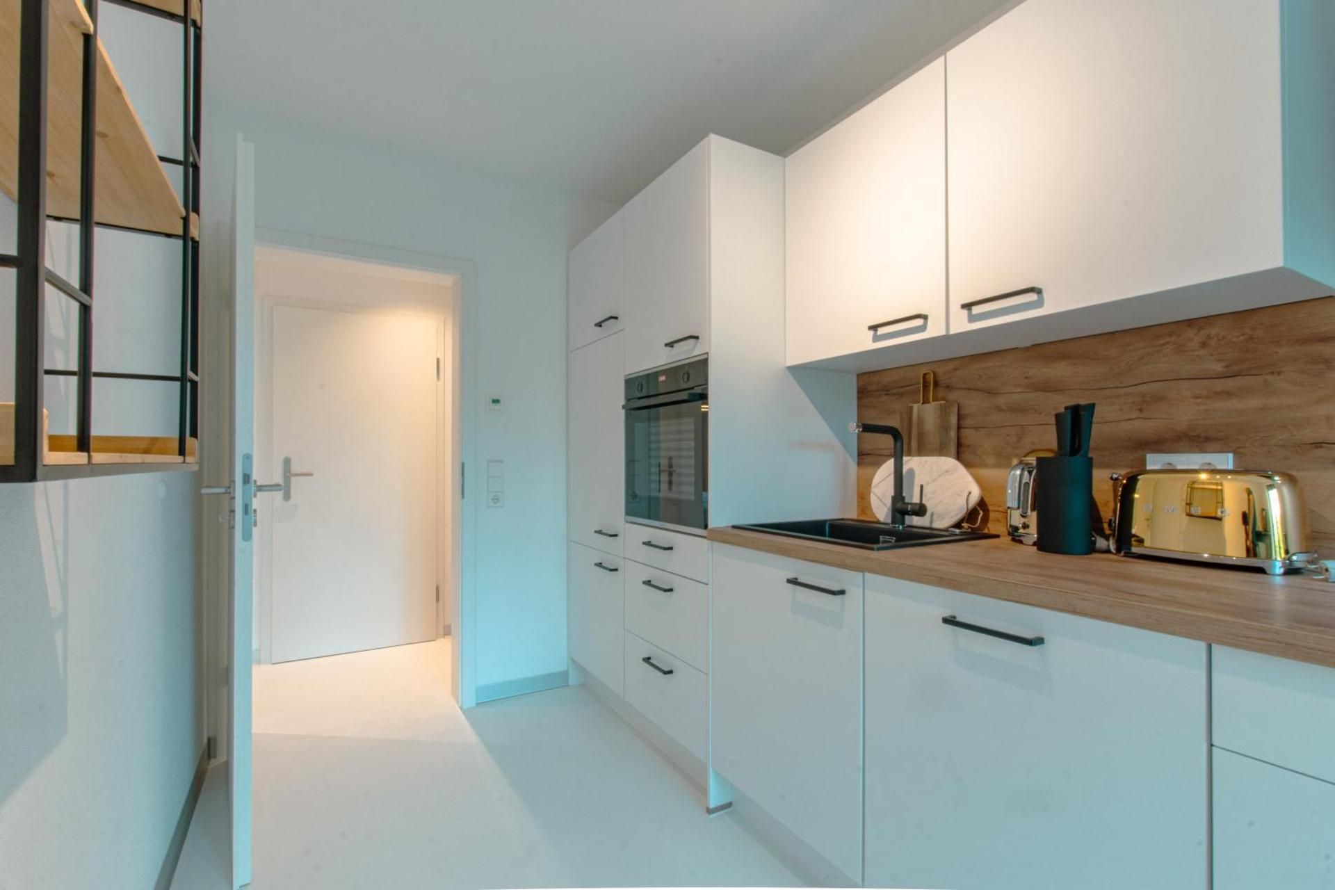 One-Bedroom Apartment with Balcony and City View