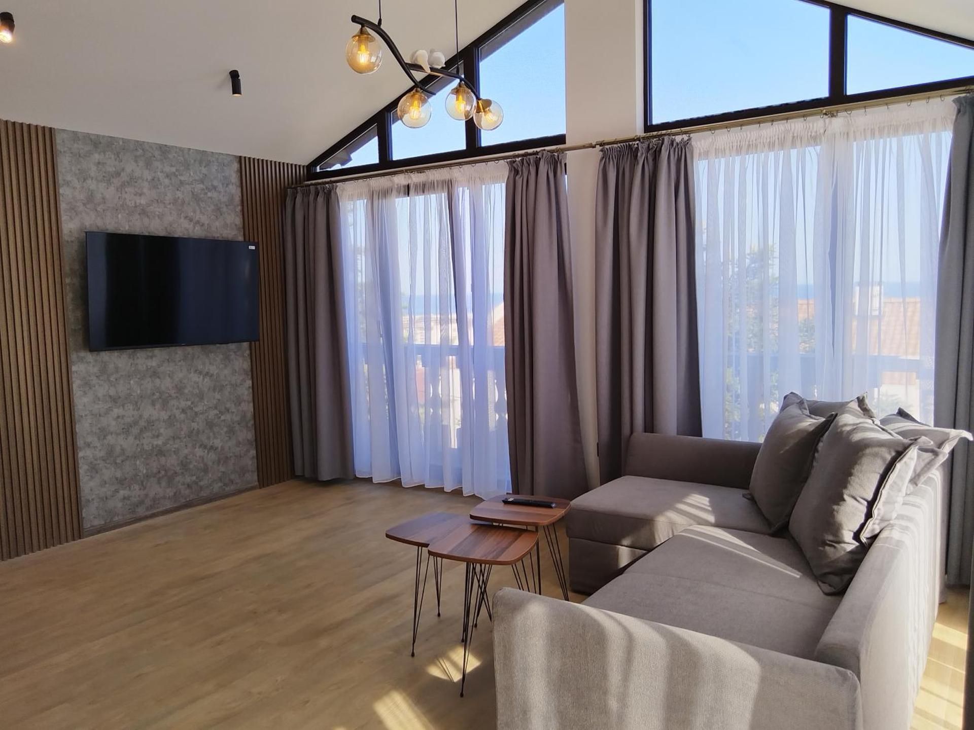 Three-Bedroom Apartment with Sea View