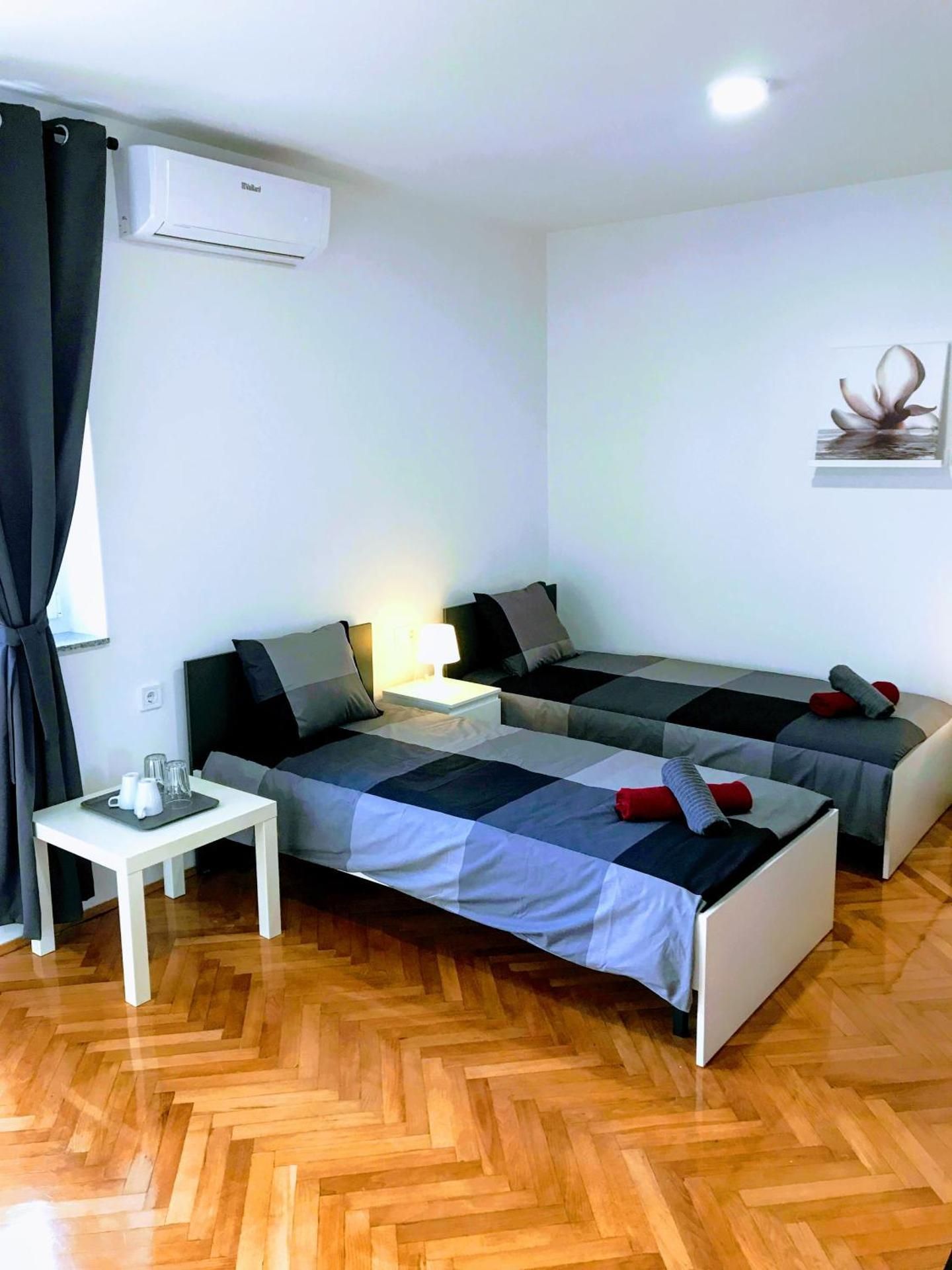Triple Room with Balcony and shared bathroom