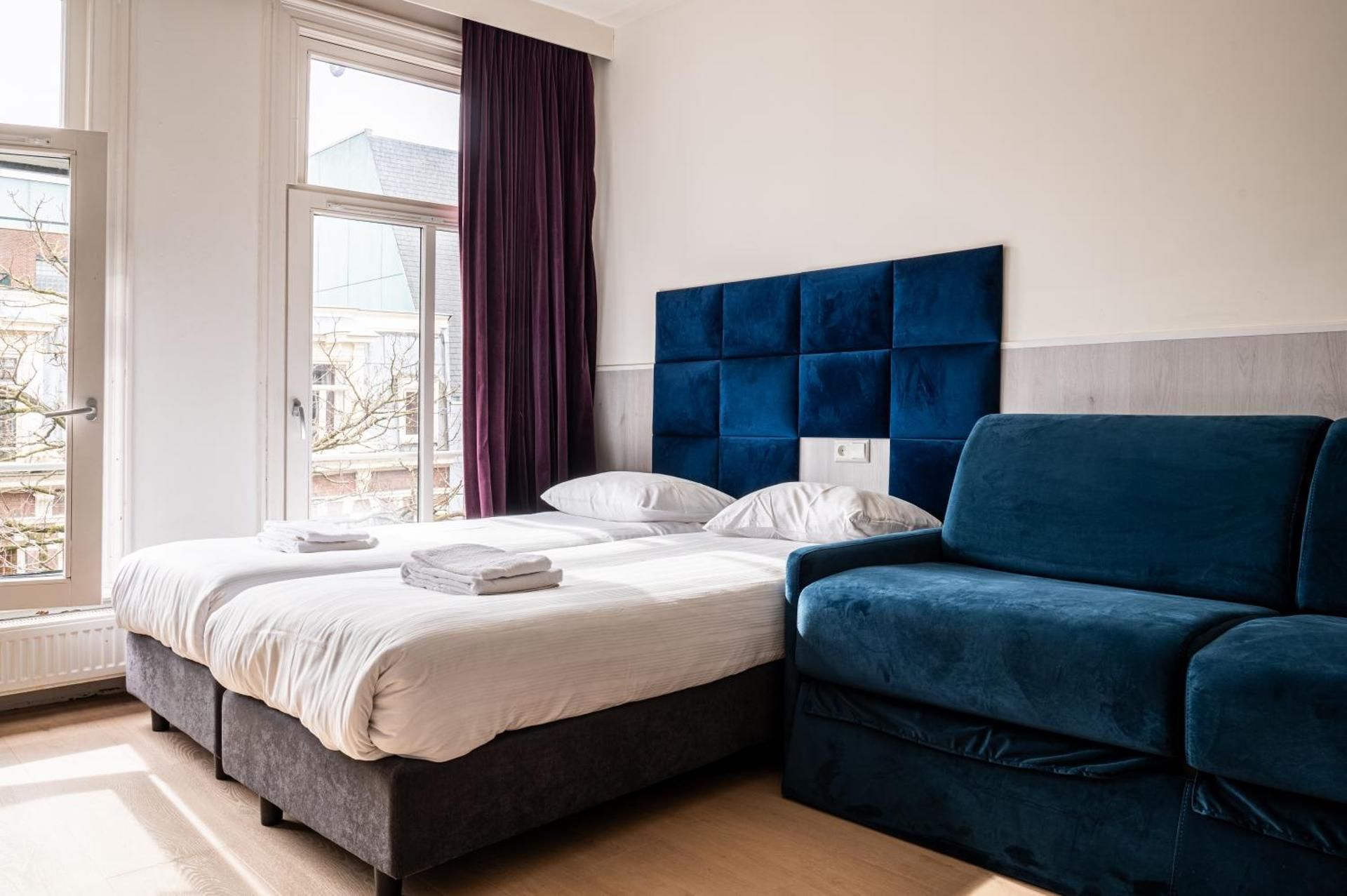 Standard Quadruple Room with Private Bathroom 