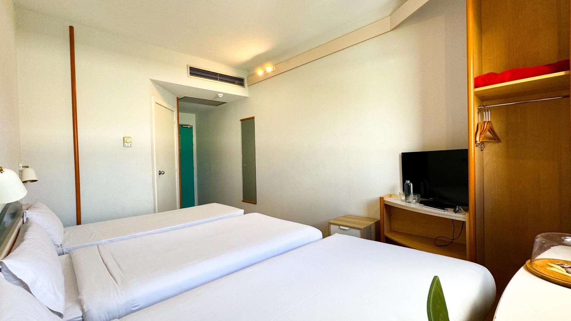 Triple Room (2 Adults + 1 Child)