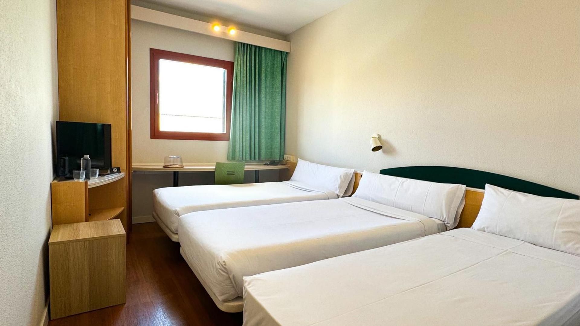 Triple Room (2 Adults + 1 Child)