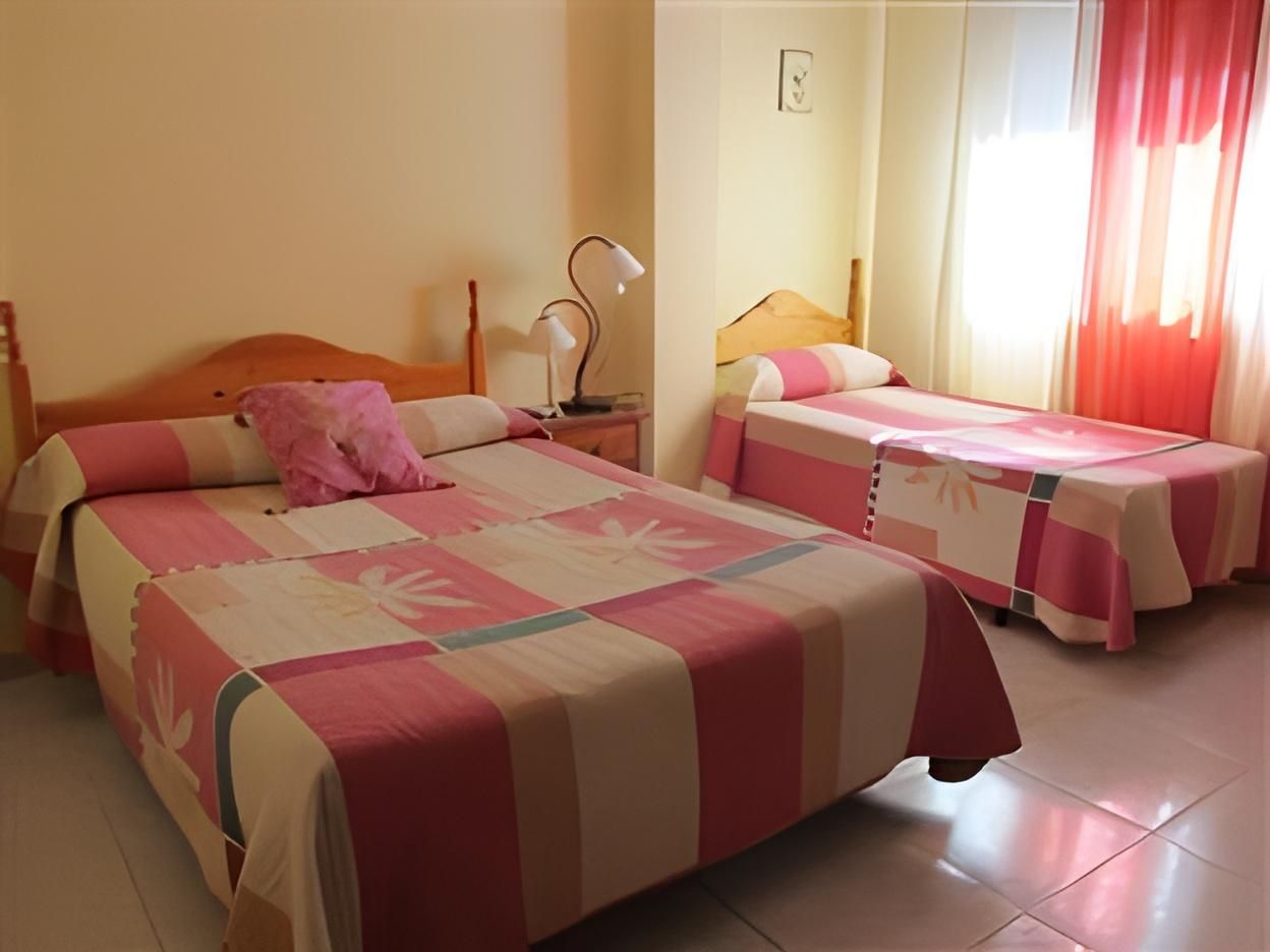 Triple - 1 Double Bed + 1 Single Bed