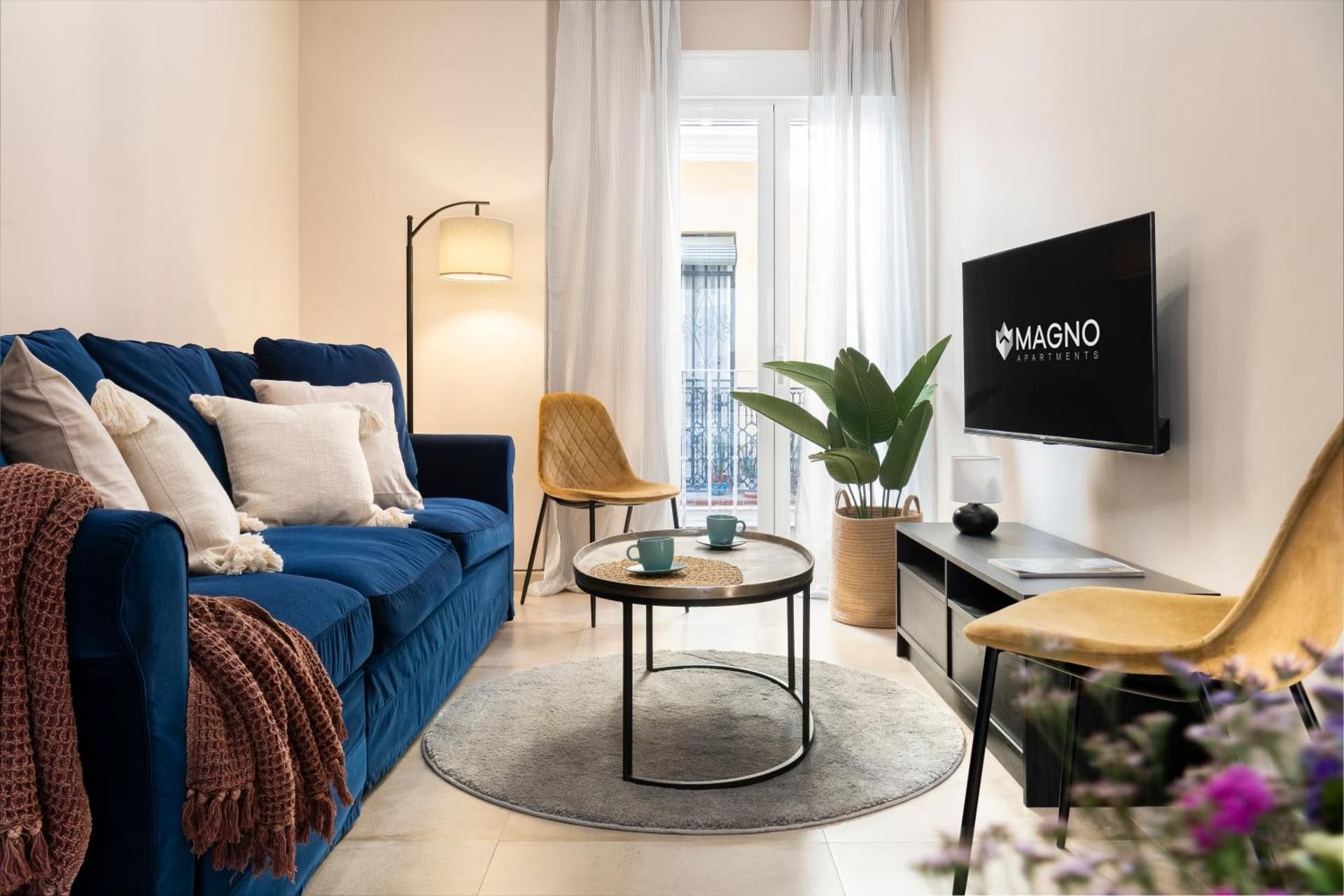 Three-Bedroom Apartment with Back Yard