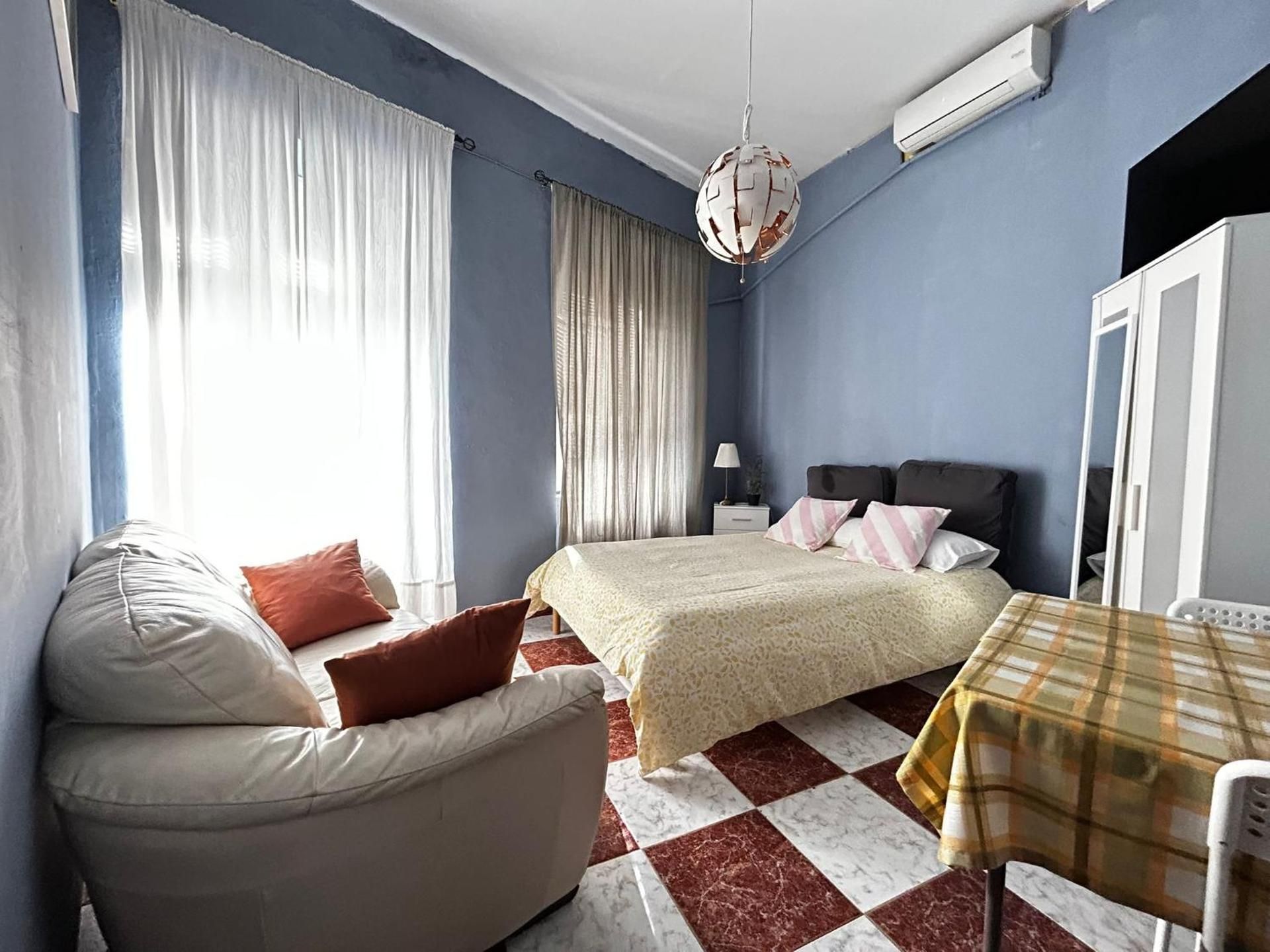Queen Room with Shared Bathroom