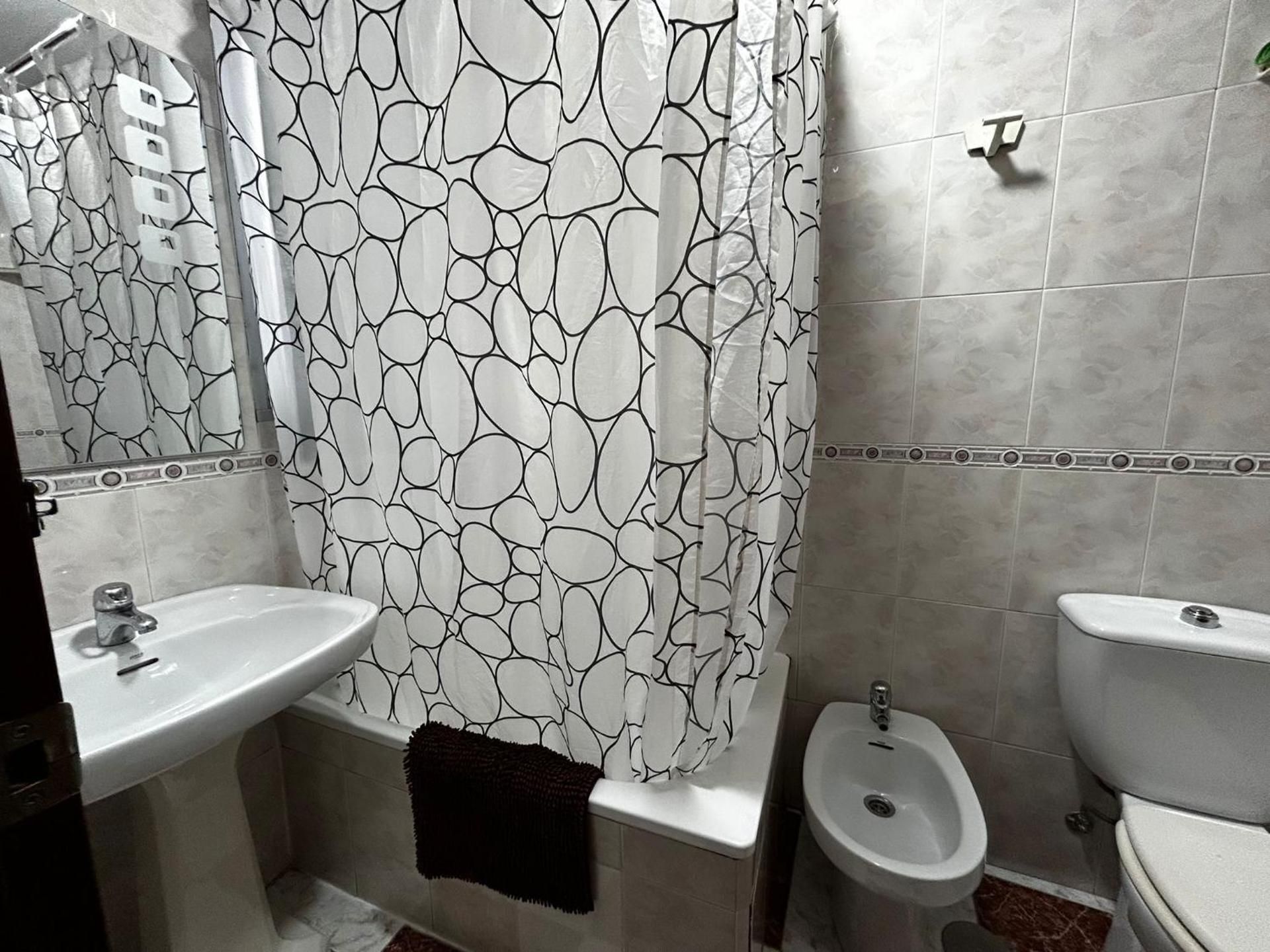 Queen Room with Shared Bathroom