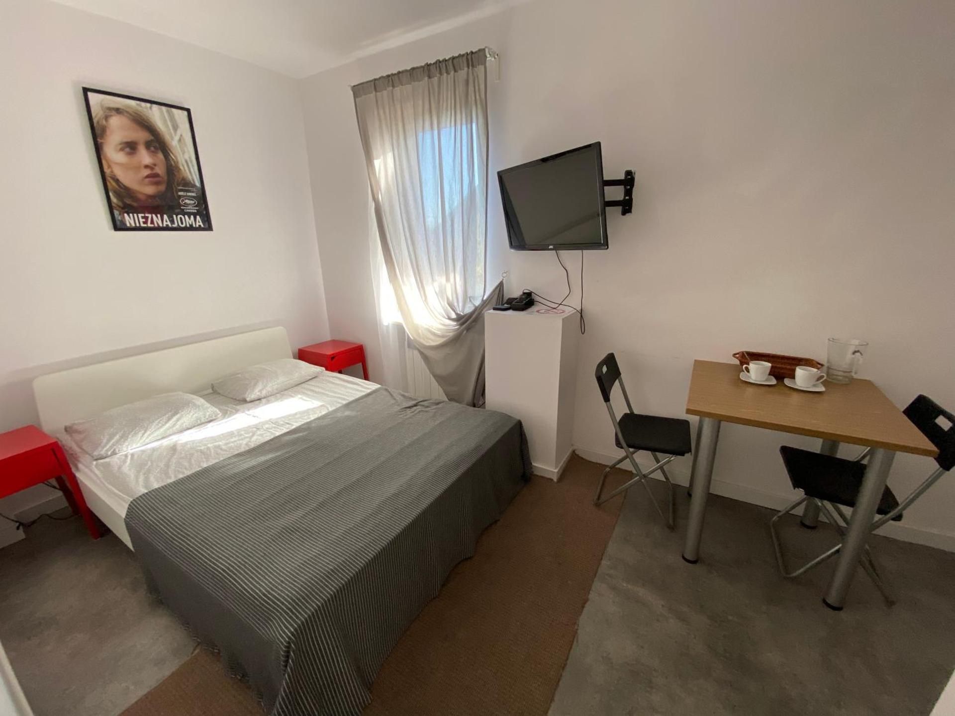 Queen Room with Shared Bathroom