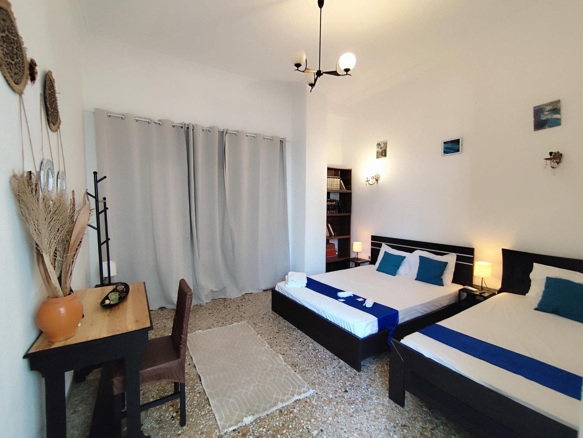 Basic Triple Room with Shared Bathroom