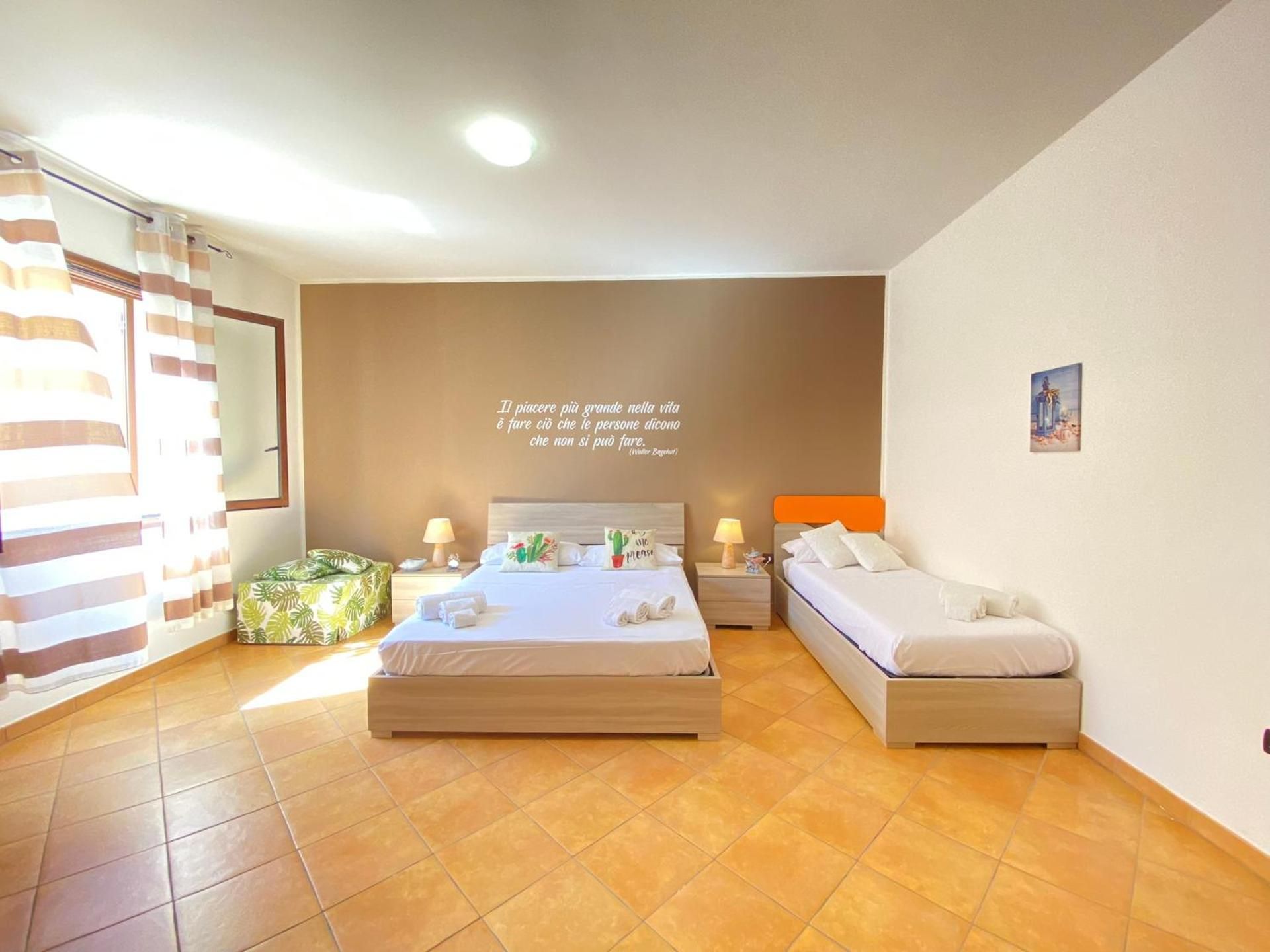 Quadruple Room with Private Bathroom