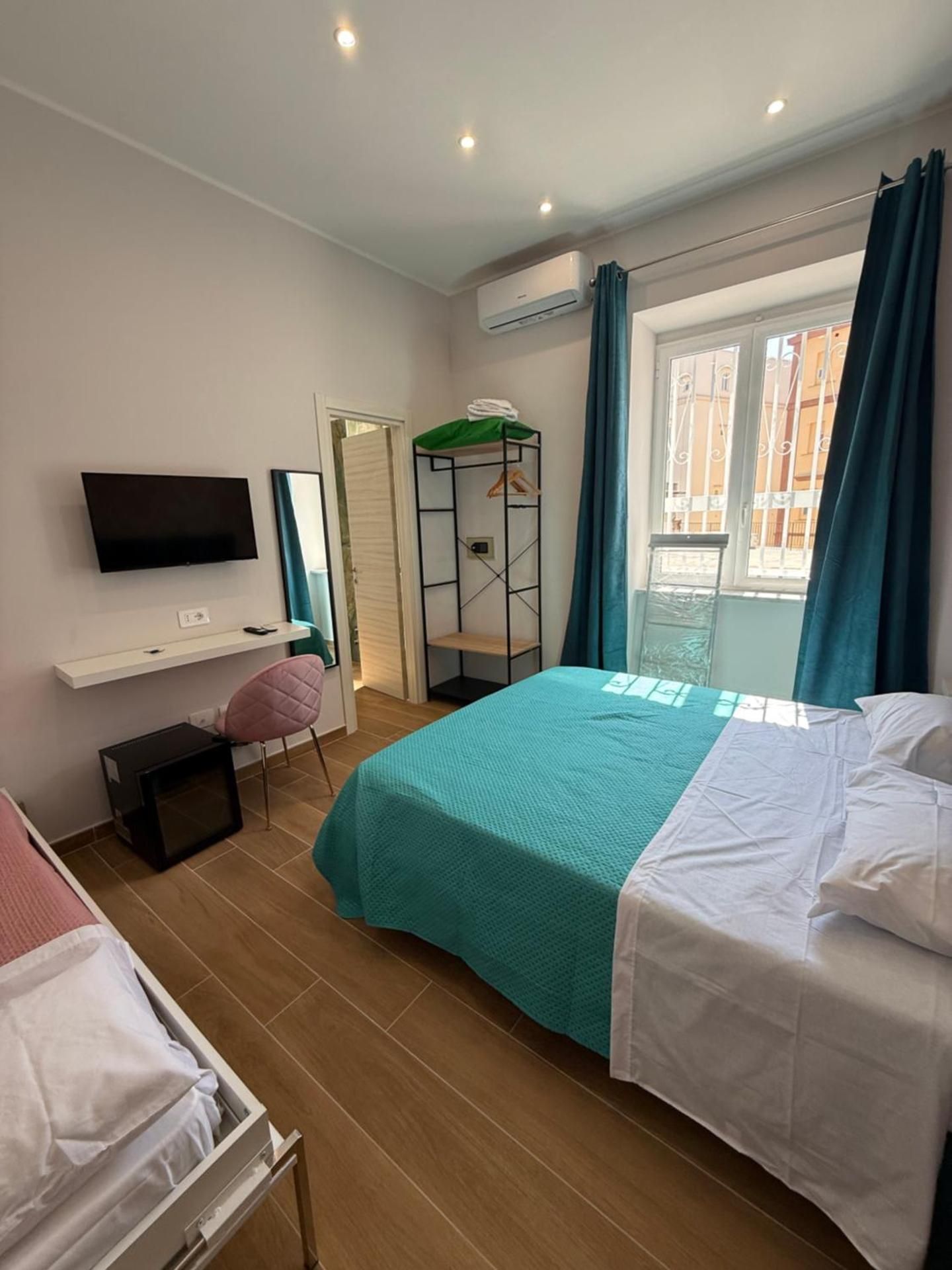 Quadruple Room with Private Bathroom