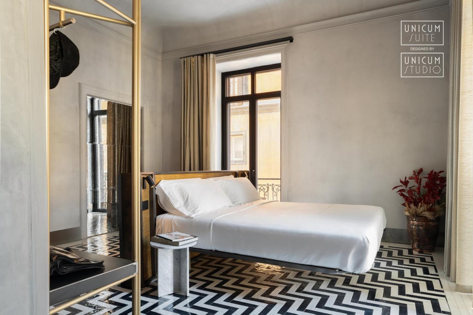 Deluxe Quadruple Suite with Spa Bath and Balcony