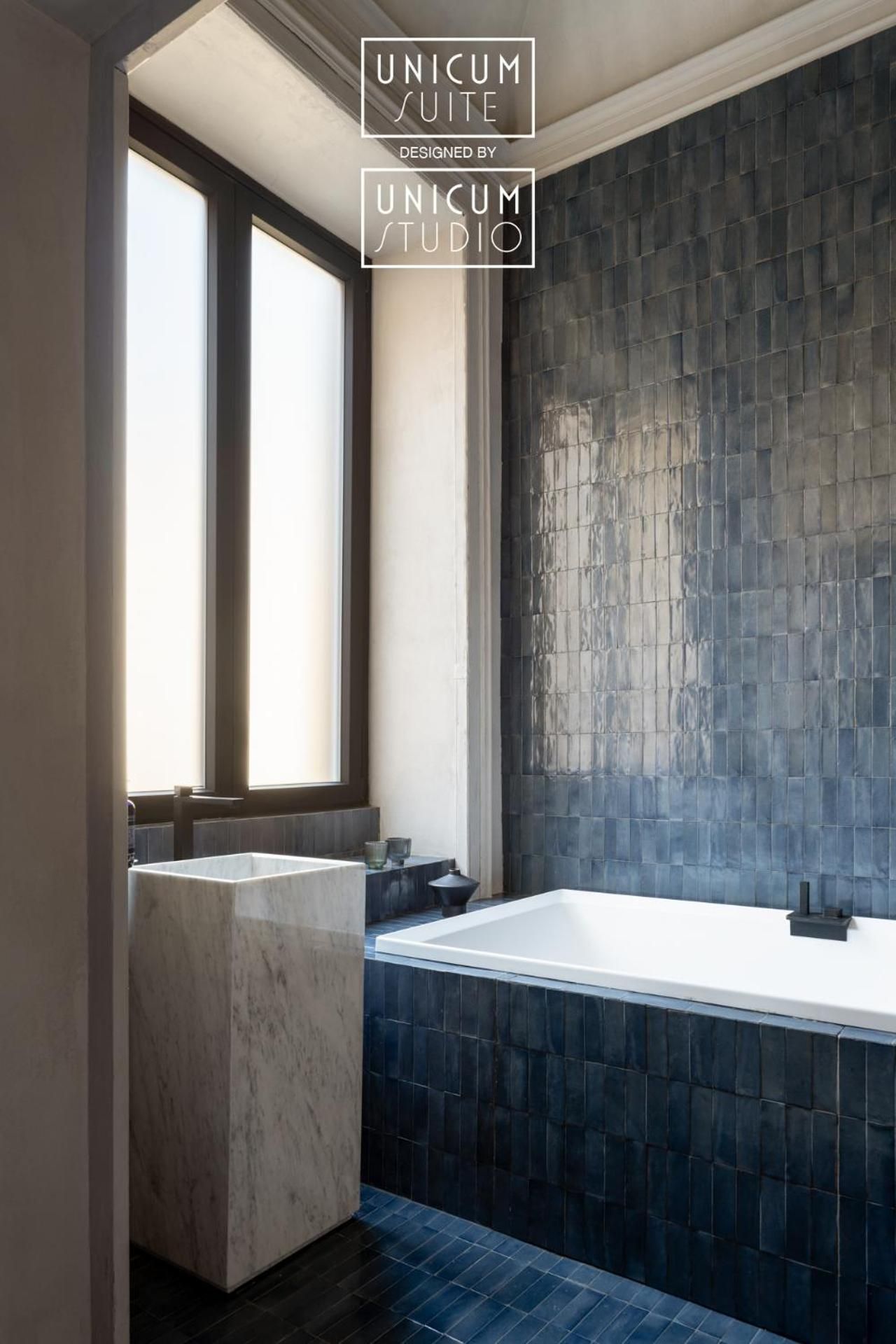 Deluxe Quadruple Suite with Spa Bath and Balcony