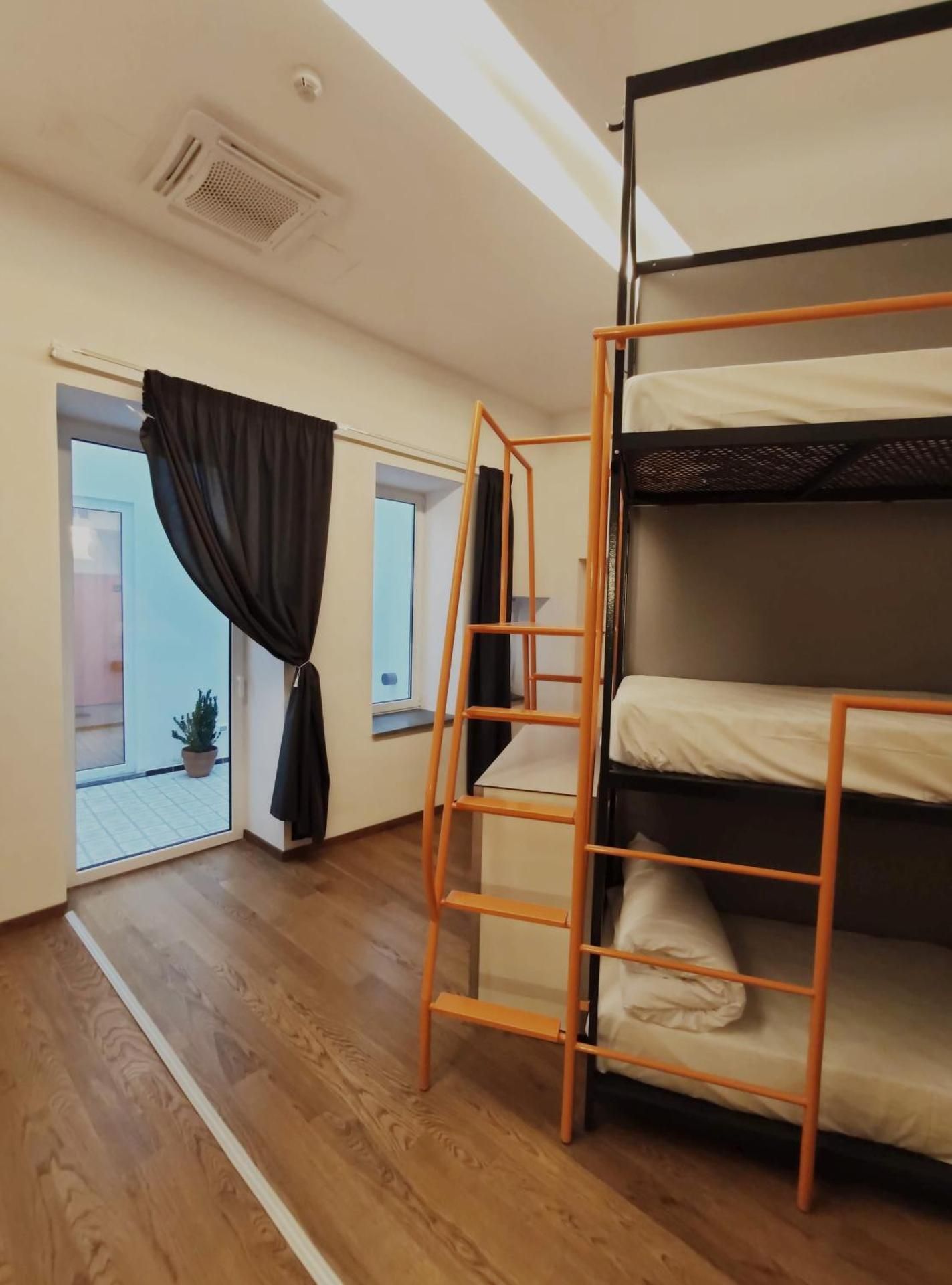 Bed in 12-Bed Mixed Dormitory Room  with Private Bathroom