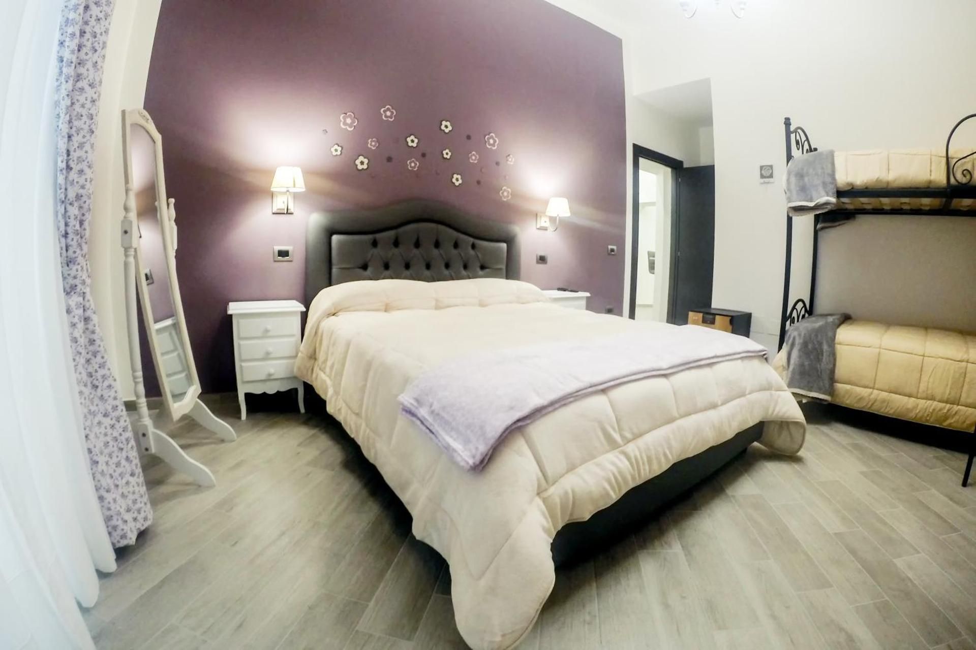 Deluxe Quadruple Room with Private Bathroom