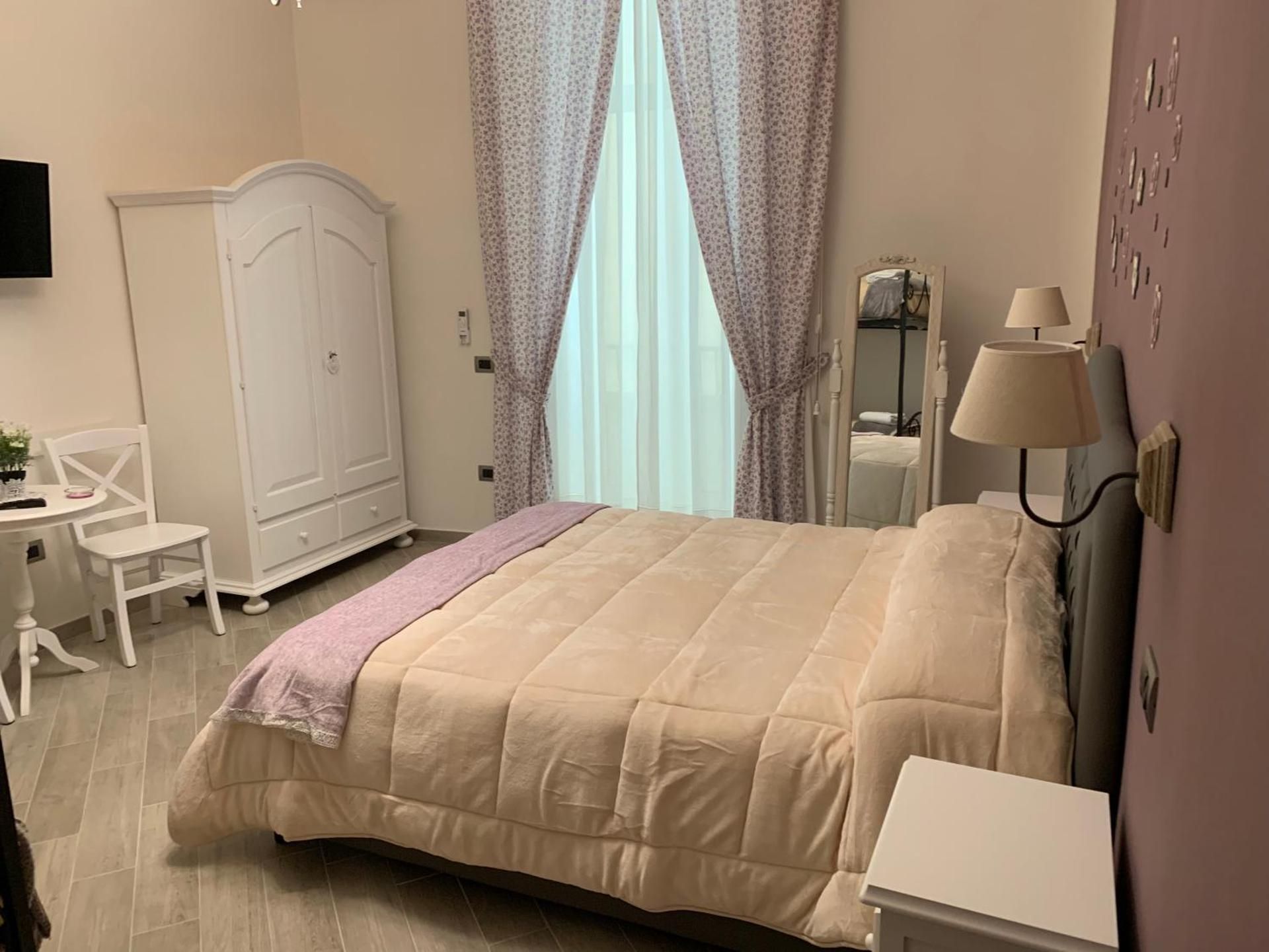 Deluxe Quadruple Room with Private Bathroom