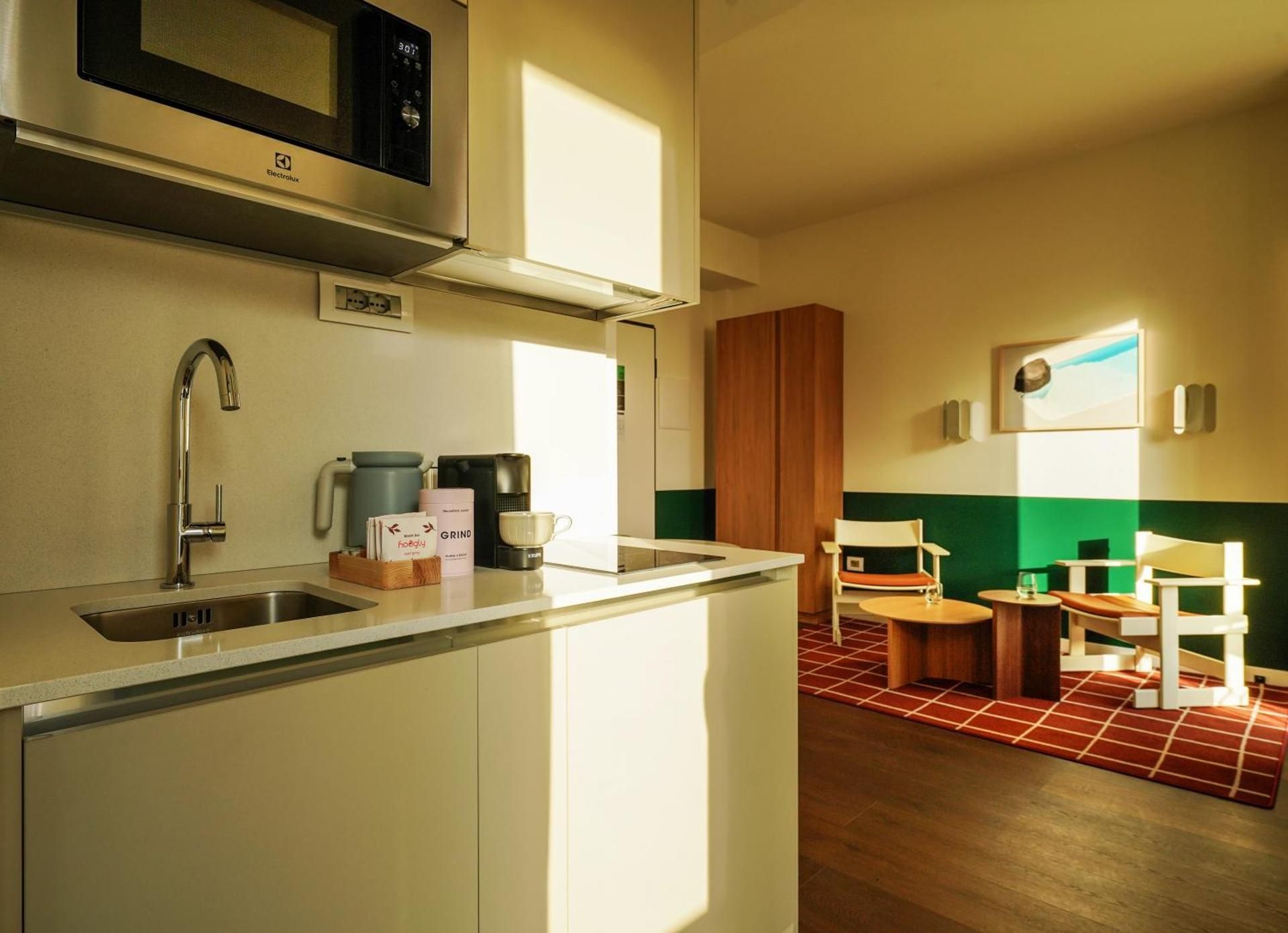 Medium Studio with Kitchenette, Balcony and Separate Living Area