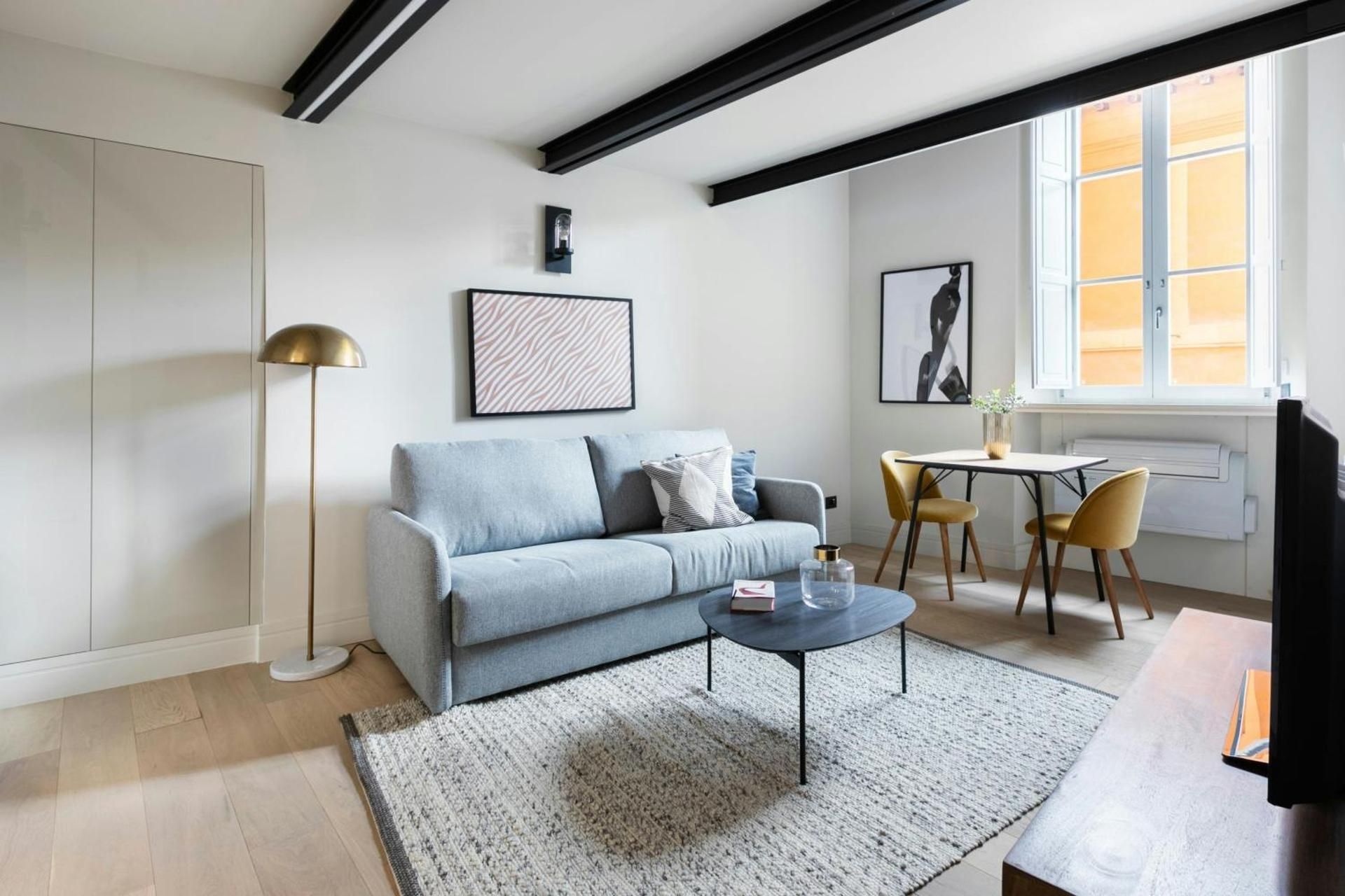 One-Bedroom Lofted Apartment with Queen Bed and Sofa Bed