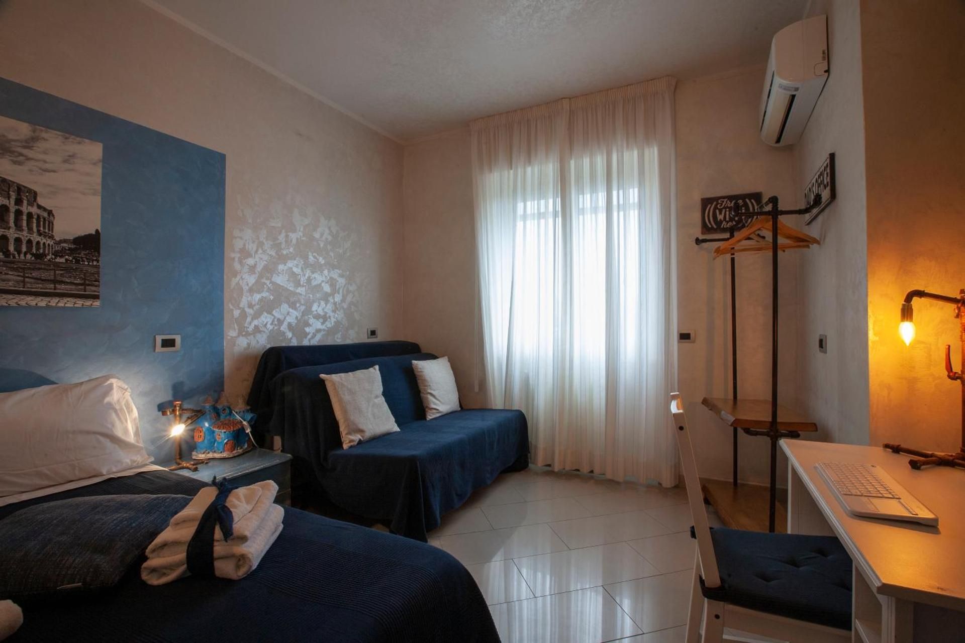 Rogiual Deluxe Triple Room 2