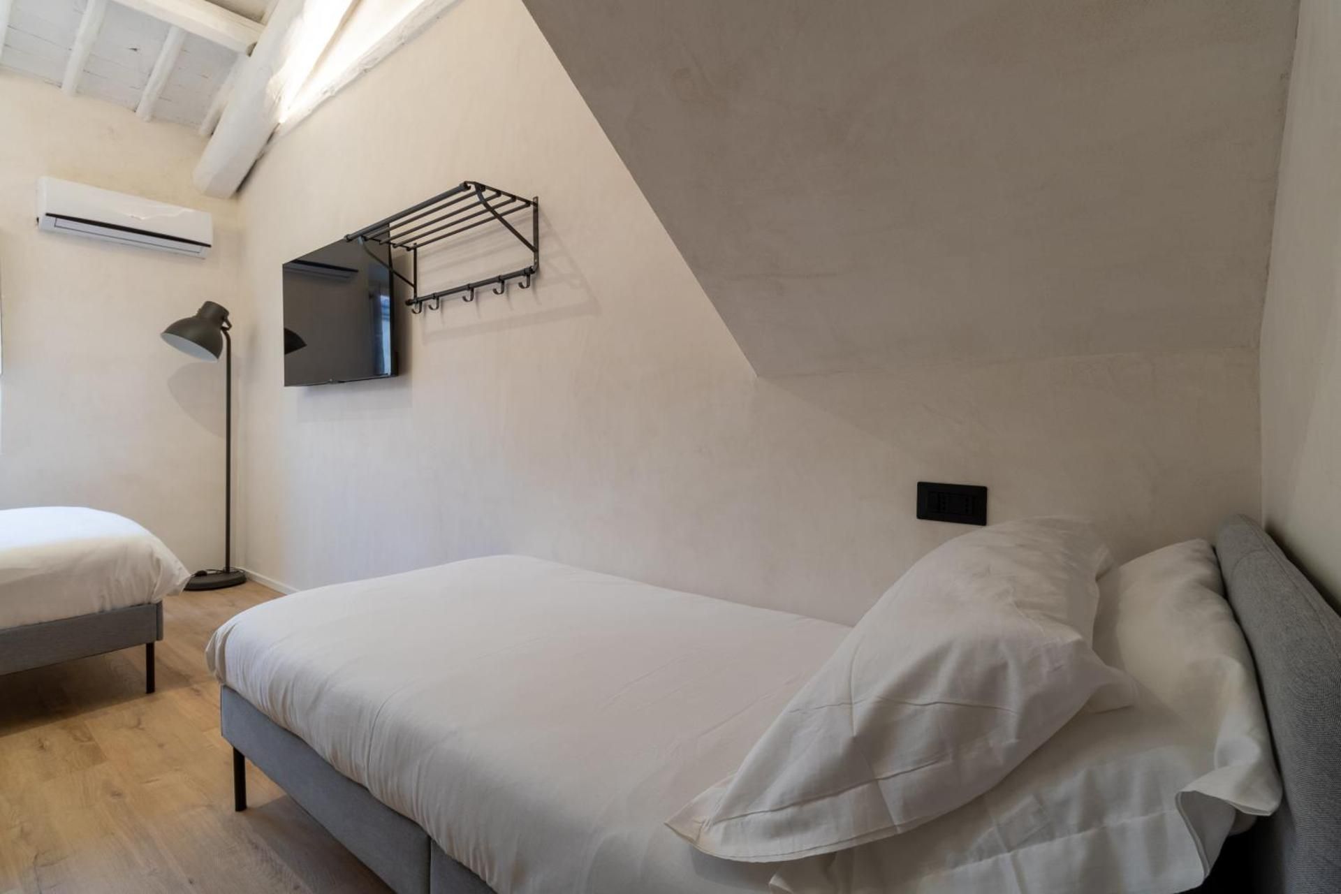 Cunabu Urbano Quadruple Room with Private Bathroom