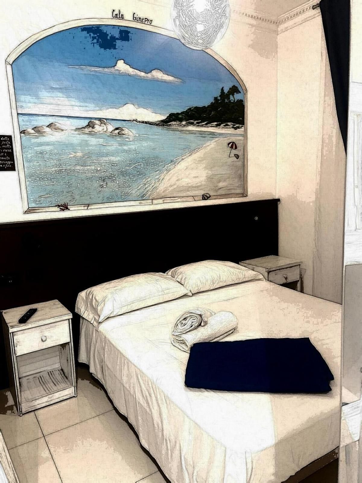 Quadruple Room with Private Bathroom