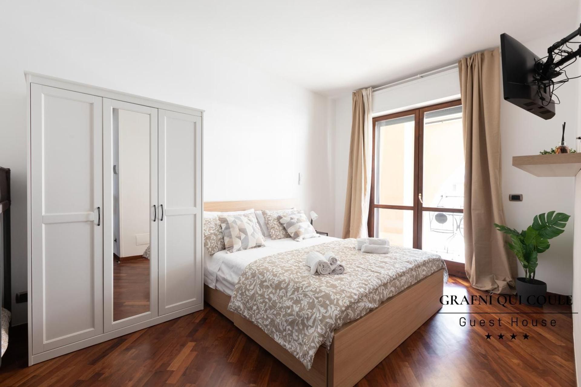 Quadruple Room with Private Bathroom