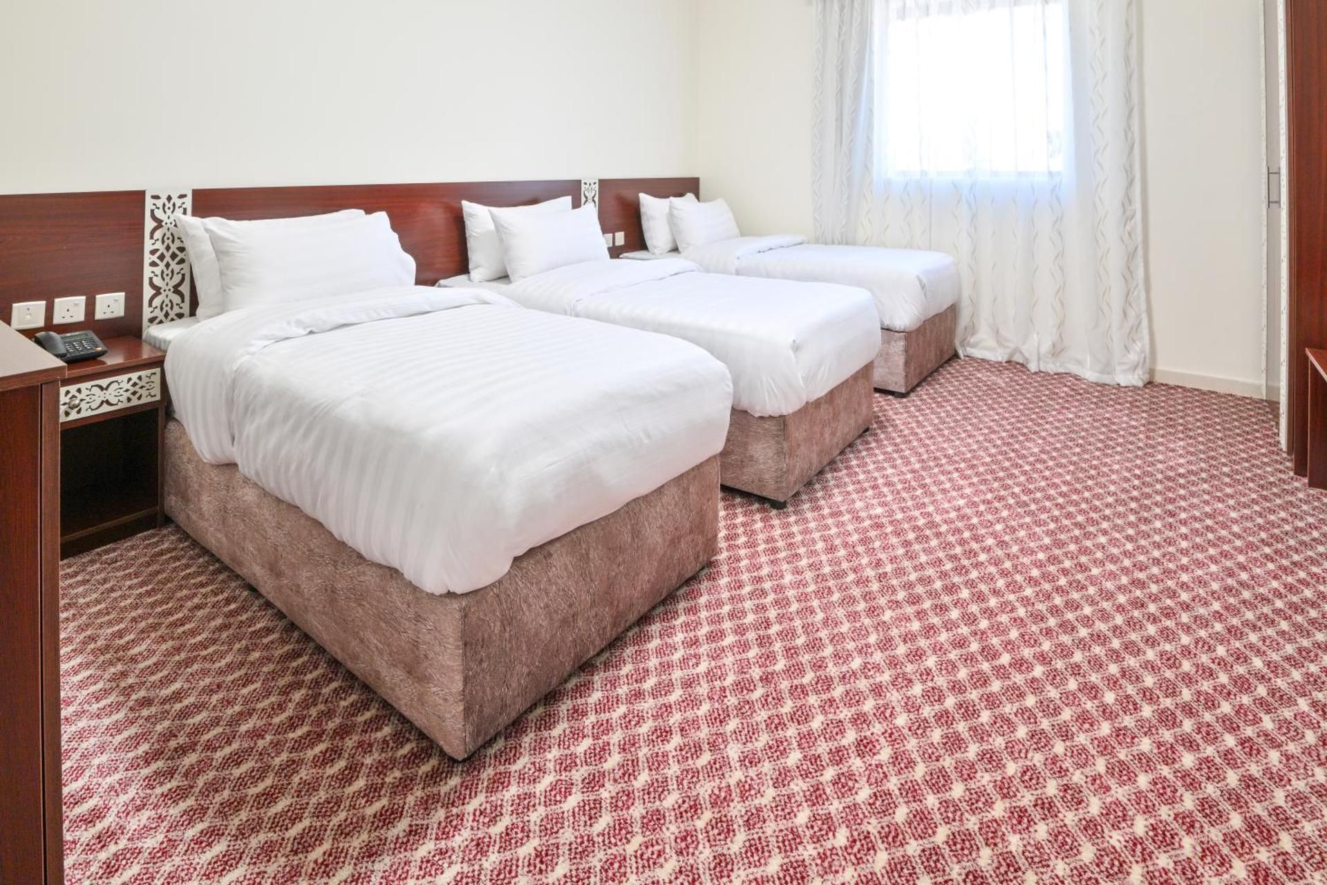 Deluxe Triple Room