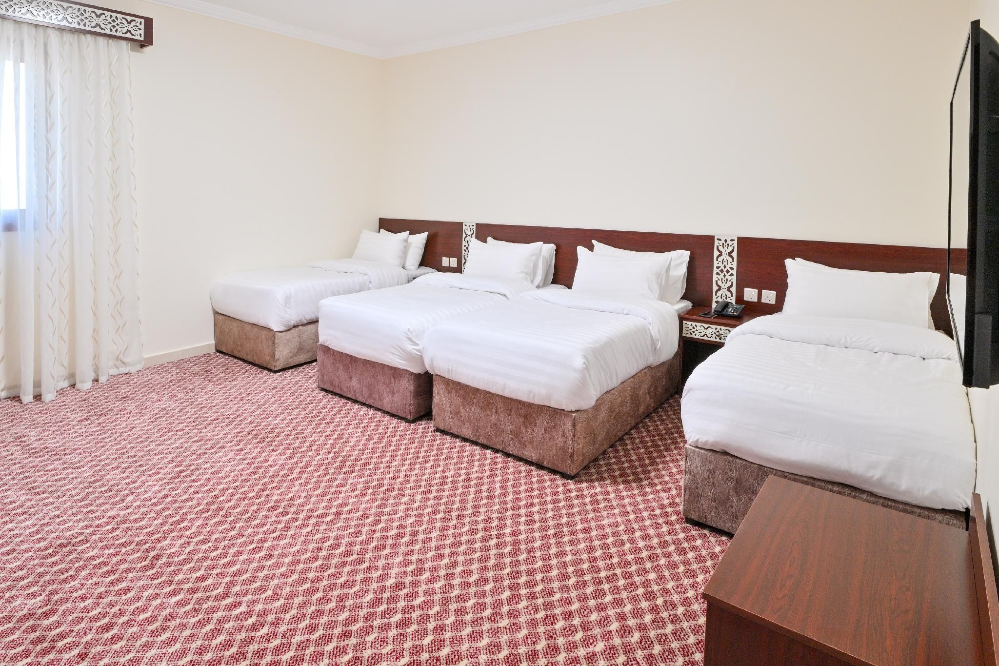 Deluxe Quadrale Room