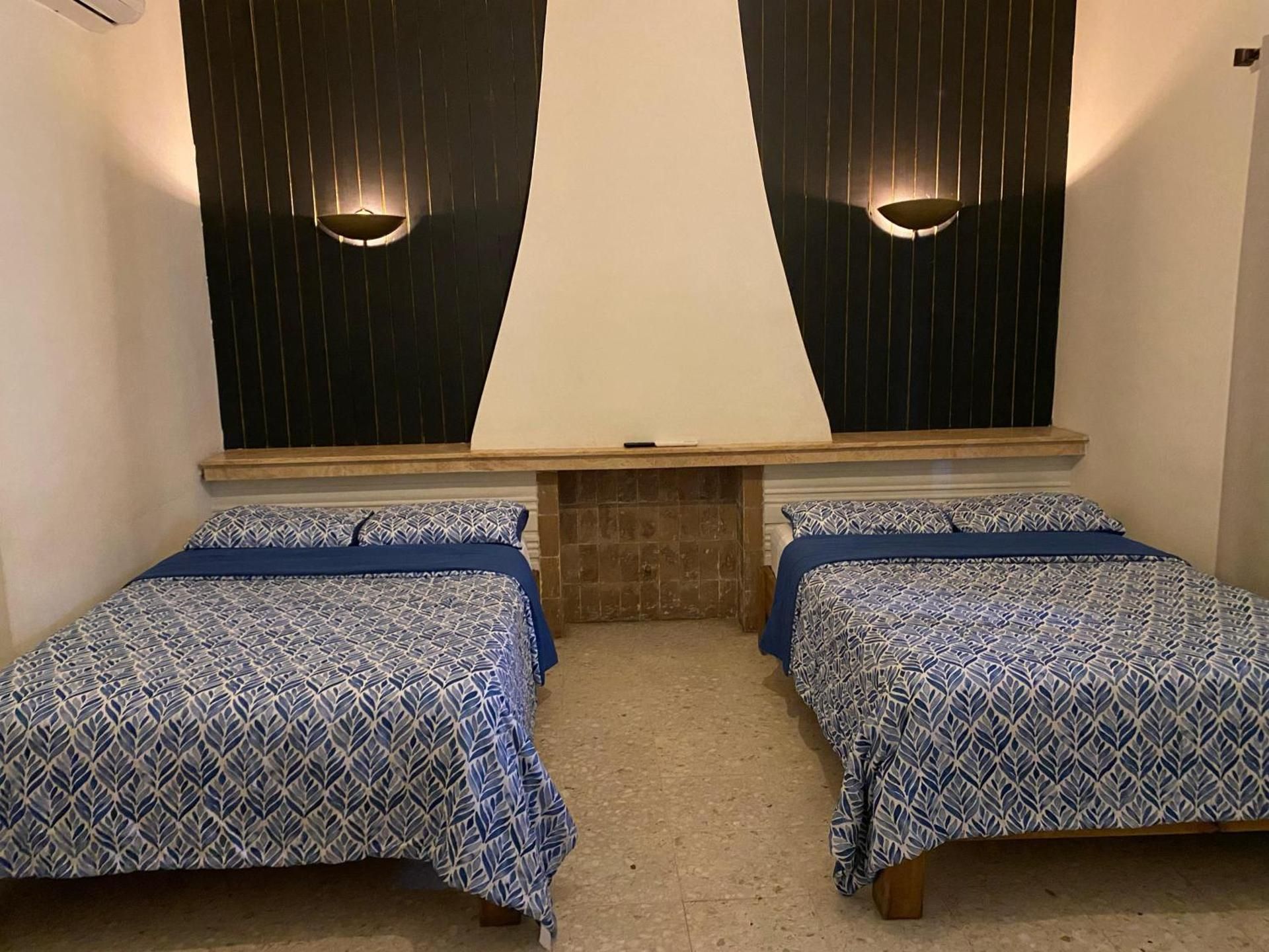 Quadruple Room with Shared Bathroom