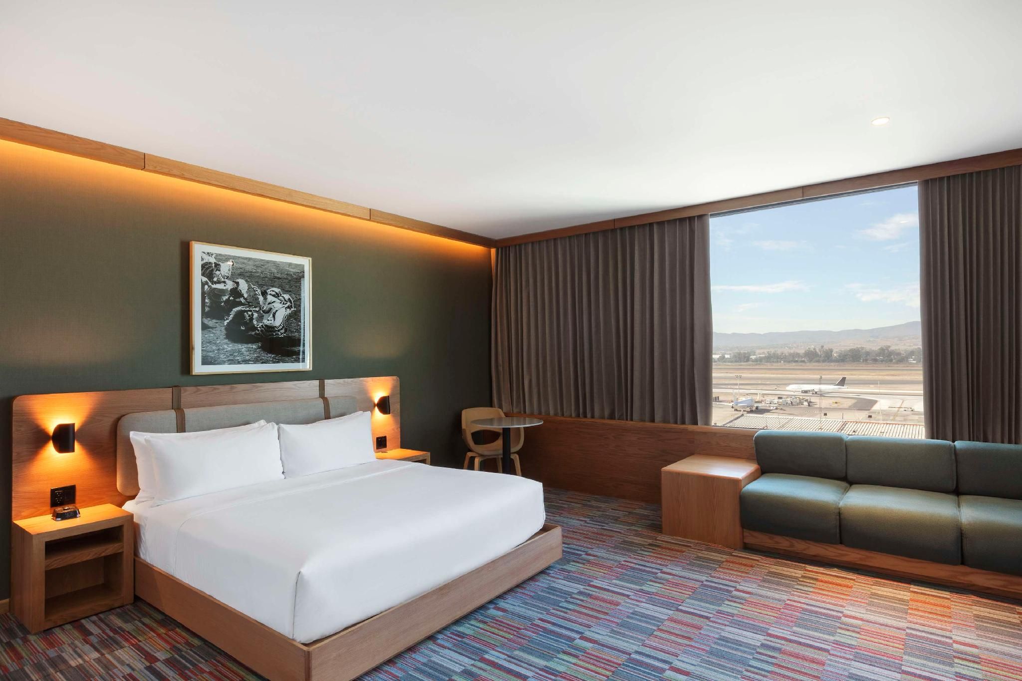 I King Bed Junior Suite with Airport View