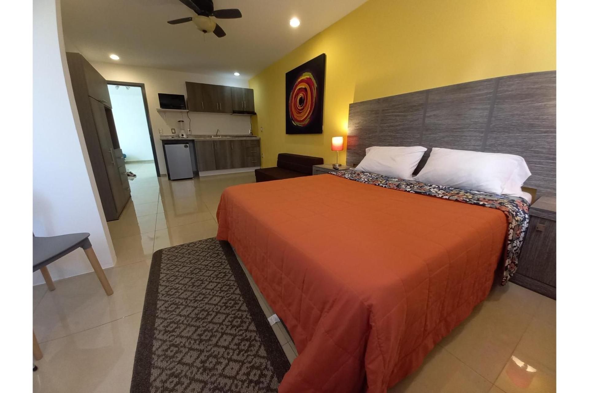 Capital O Tu Estancia Family Suite