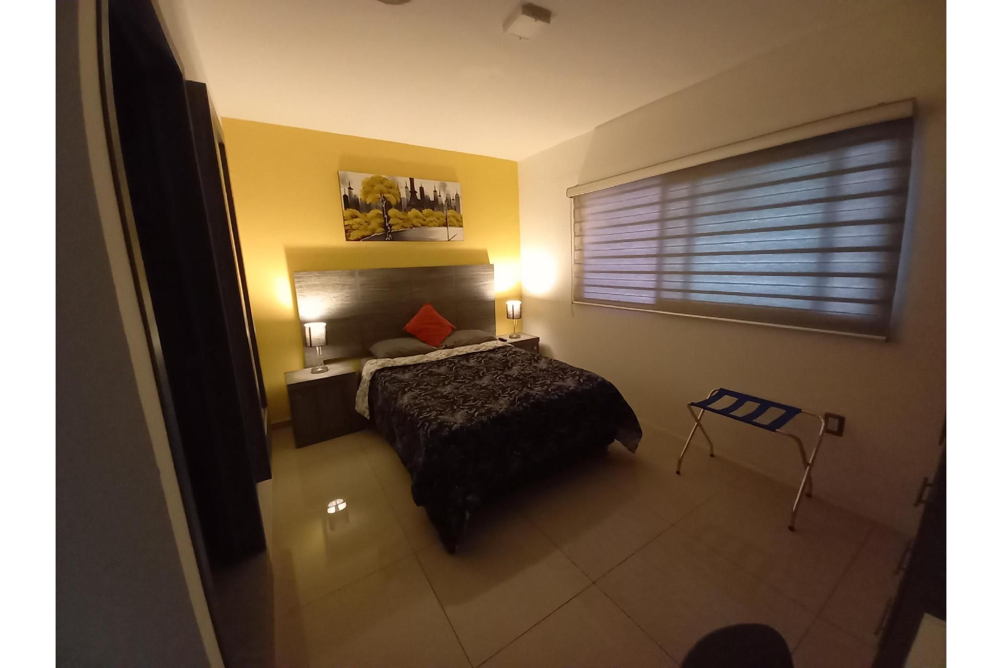 Capital O Tu Estancia Deluxe Double 3