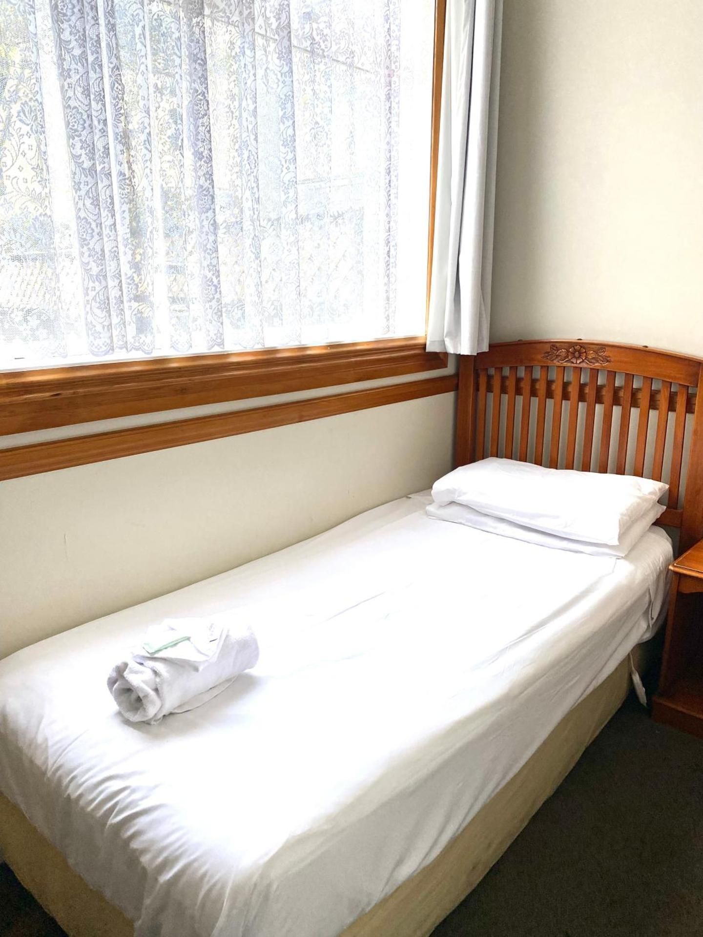 Single Room Shared Bathroom