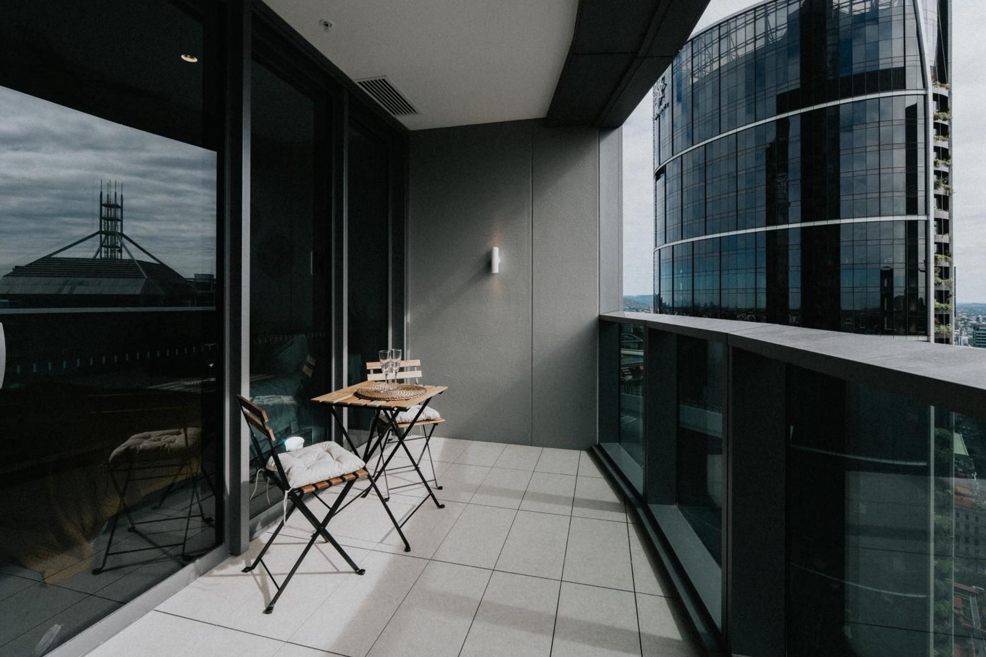 One-Bedroom Apartment with Balcony and City View