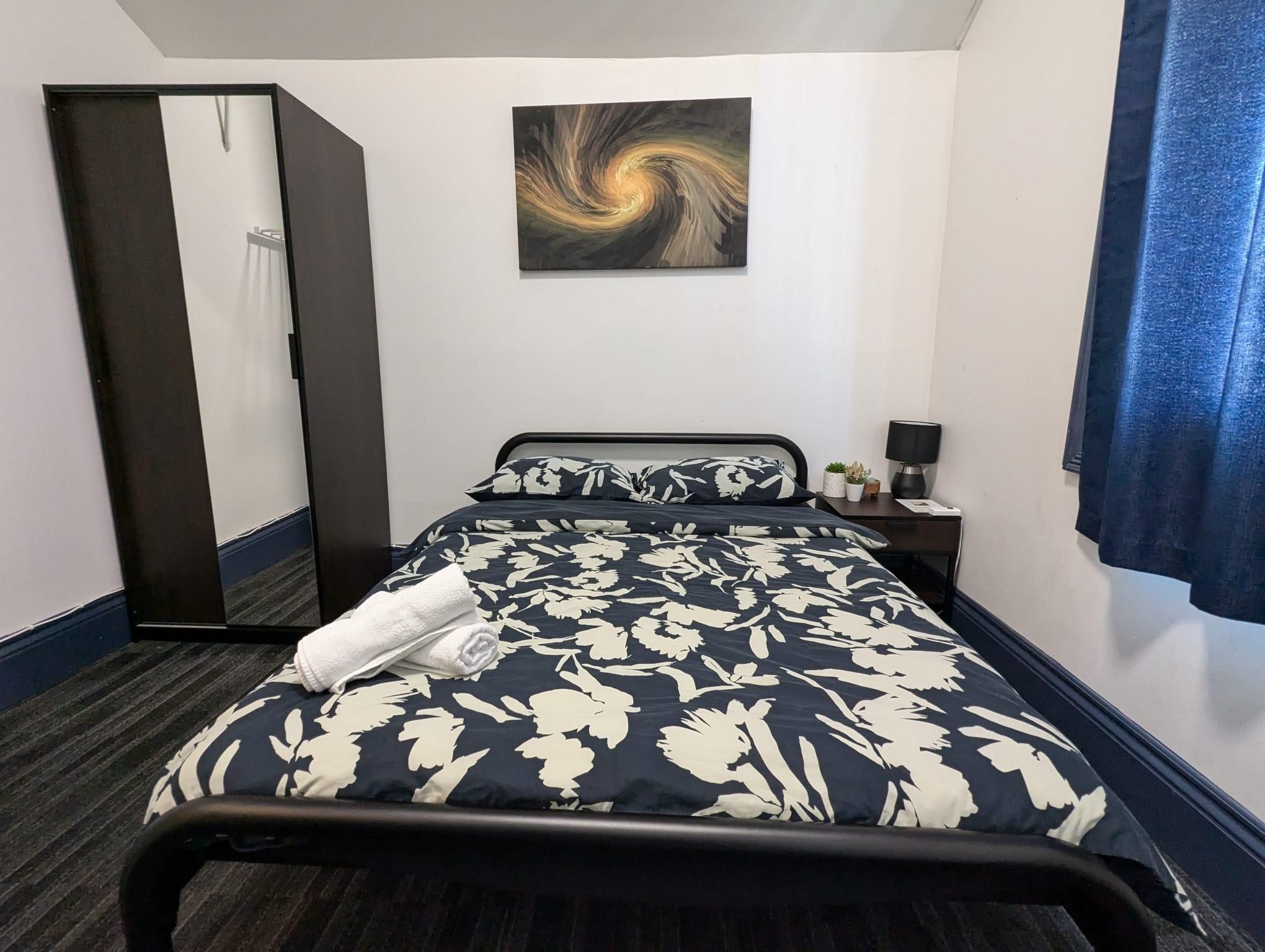 Basic Double Room with Shared Bathroom