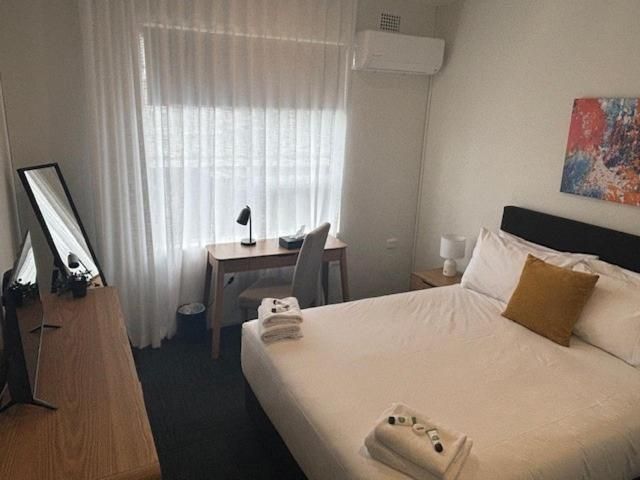 Queen Room with Shared Bathroom
