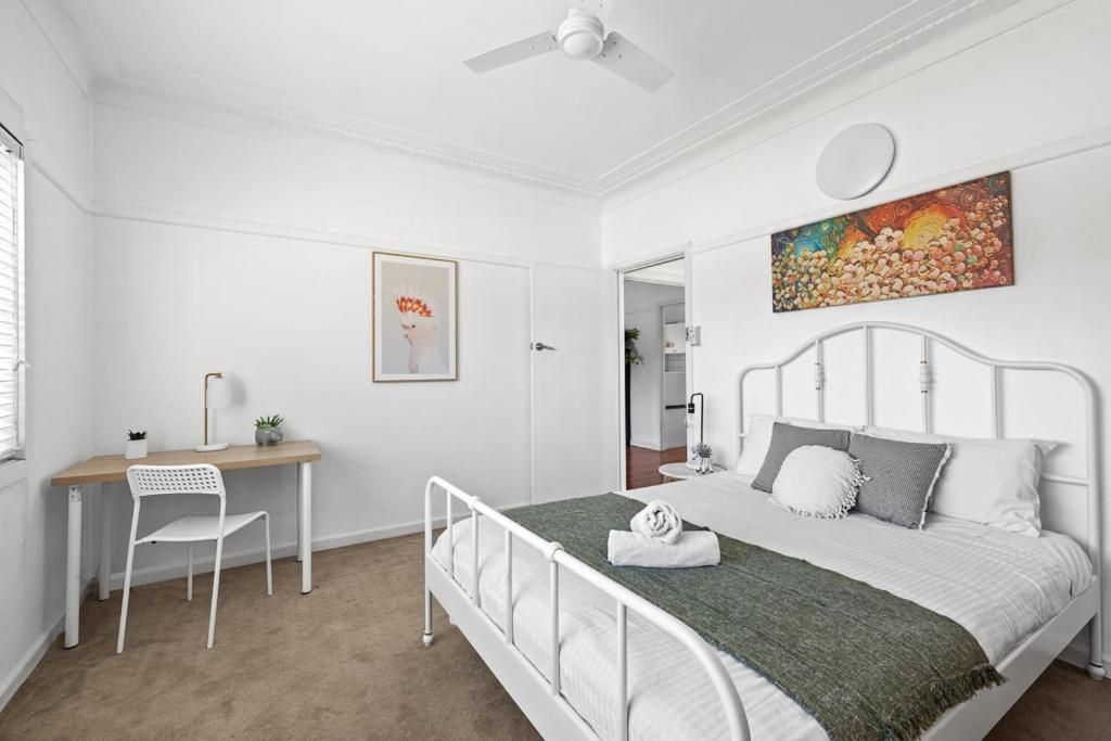 Queen Room with Shared Bathroom