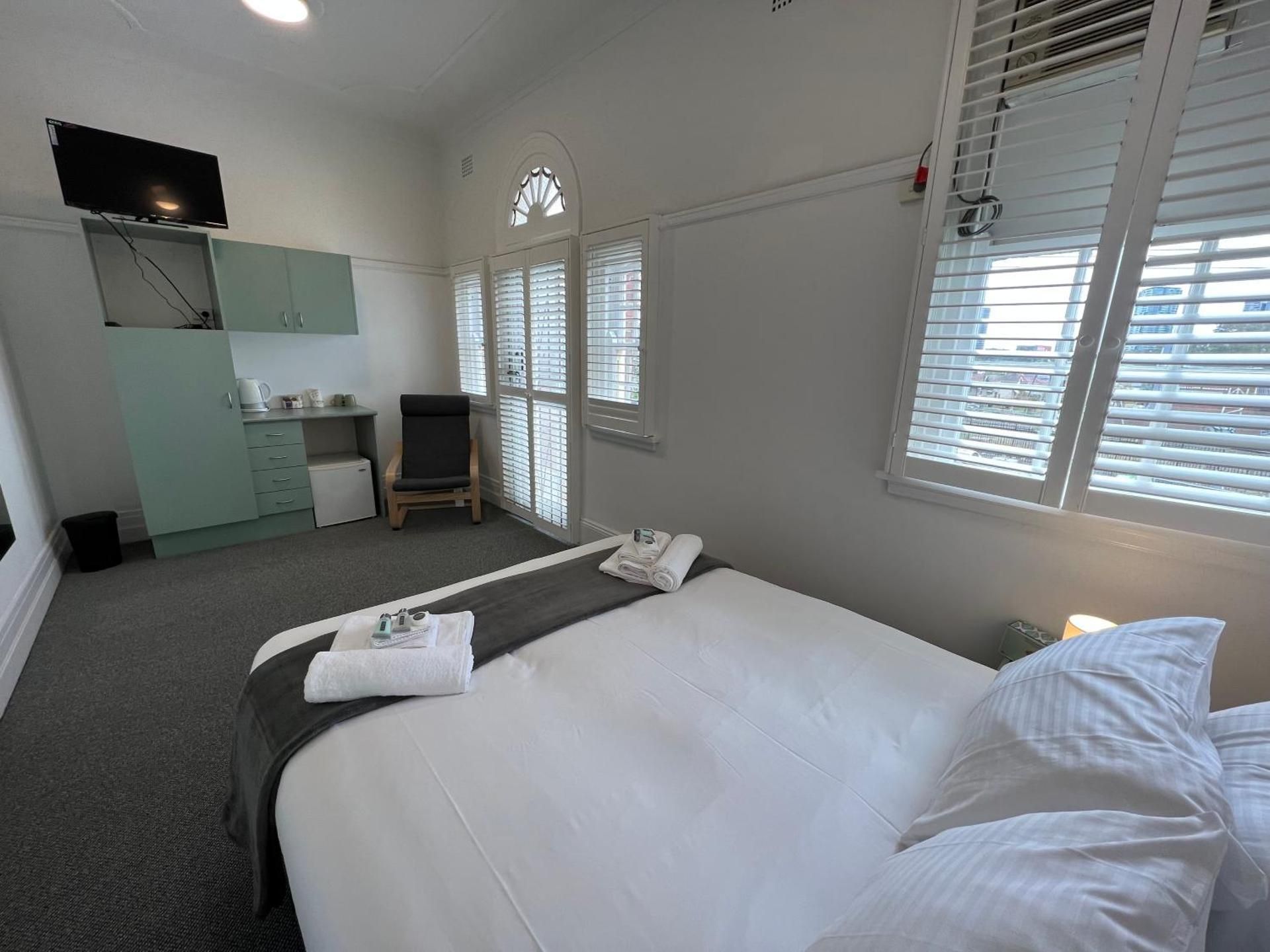 Queen Room with Shared Bathroom